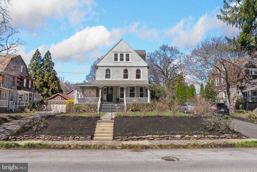 Situated a short walk from idyllic downtown Swarthmore and historic Swarthmore College, 419 Yale Ave is a pridefully maintained 3-story Victorian that offers an enticing blend of original character and modern updates. This 3,300 sqft home has 5 bedrooms, plus a study, 3.5 bathrooms, a finished basement, an expansive backyard, and placement within the award-winning Wallingford-Swarthmore School District. Out front, charming curb appeal is on display in the lush shrubbery, manicured lawn, mature trees, and a wraparound porch. Inside, you're welcomed by a foyer that showcases the intricate millwork, crown molding, and wainscotting found throughout the home. Original hardwood floors extend through a wide archway into the living room that is filled with natural light from a set of bay windows. Pocket doors open to a formal dining room with more bay windows and plenty of space for entertaining. Off the main hall, there's a split staircase, a powder room, and a mudroom with a side entry from the driveway. The hub of the home is sure to be the large, sunlit kitchen at the rear of the main level. It has a breakfast nook, a peninsula with seating, generous counter space, custom cabinetry, a double sink, stainless steel appliances, including a wine fridge, and lots of picturesque windows. Patio doors open to the fenced backyard, where tall, shady trees create a private oasis during the spring and summer months for outdoor play, gardening, barbecues, and alfresco dining on the paver patio. On the home's second level, two bedrooms and a full bathroom sit off the stairs. A study leads to the hotel-like primary suite that boasts a large bedroom with vaulted ceilings, an arched window with a seat overlooking the backyard, two bespoke walk-in closets, and an attached bathroom with a double vanity, soaking tub, and a glass-enclosed shower. Up on the third level, there are two more bedrooms, another full bathroom, and attic storage. Additional living space is found in the finished basement, perfect for a den and playroom, along with a storage room, and a laundry room that has access to the backyard. Utilities include central a/c, gas forced-air heat, radiators, and gas hot water. 419 Yale Ave is a fantastic home with an equally fantastic location! Swarthmore is a sought-after neighborhood known for historic charm, tree-lined streets, and a welcoming sense of community. Restaurants, cafes, and local businesses are downtown, and Swarthmore College sits on sprawling bucolic land with its own arboretum. There's also easy access to shopping along Baltimore Pike, I-476, I-95, and Center City Philadelphia via the SEPTA Regional Rail. Schedule your tour today!