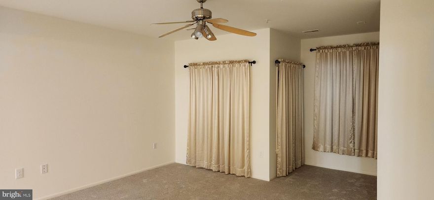 Rarely available 1br  1ba condo in the spring mills community. With new carpet, new  bathroom tile and a fresh, professional paint job, this unit is move in ready with washer/dryer, stove, oven, microwave, fridge and garbage disposal providing  for all kitchen conveniences.  Located in an elevator service building in this gated community, this unit comes with it's own separately deeded garage parking space and boasts a picturesque view of a tranquil wooded area from the second story balcony.  Leave exterior maintenance concerns behind and never shovel snow again while you live here enjoying the community pool, and tennis facilities.  Don't expect this opportunity to last long as recent marketing times are quite short especially for units in such excellent condition.