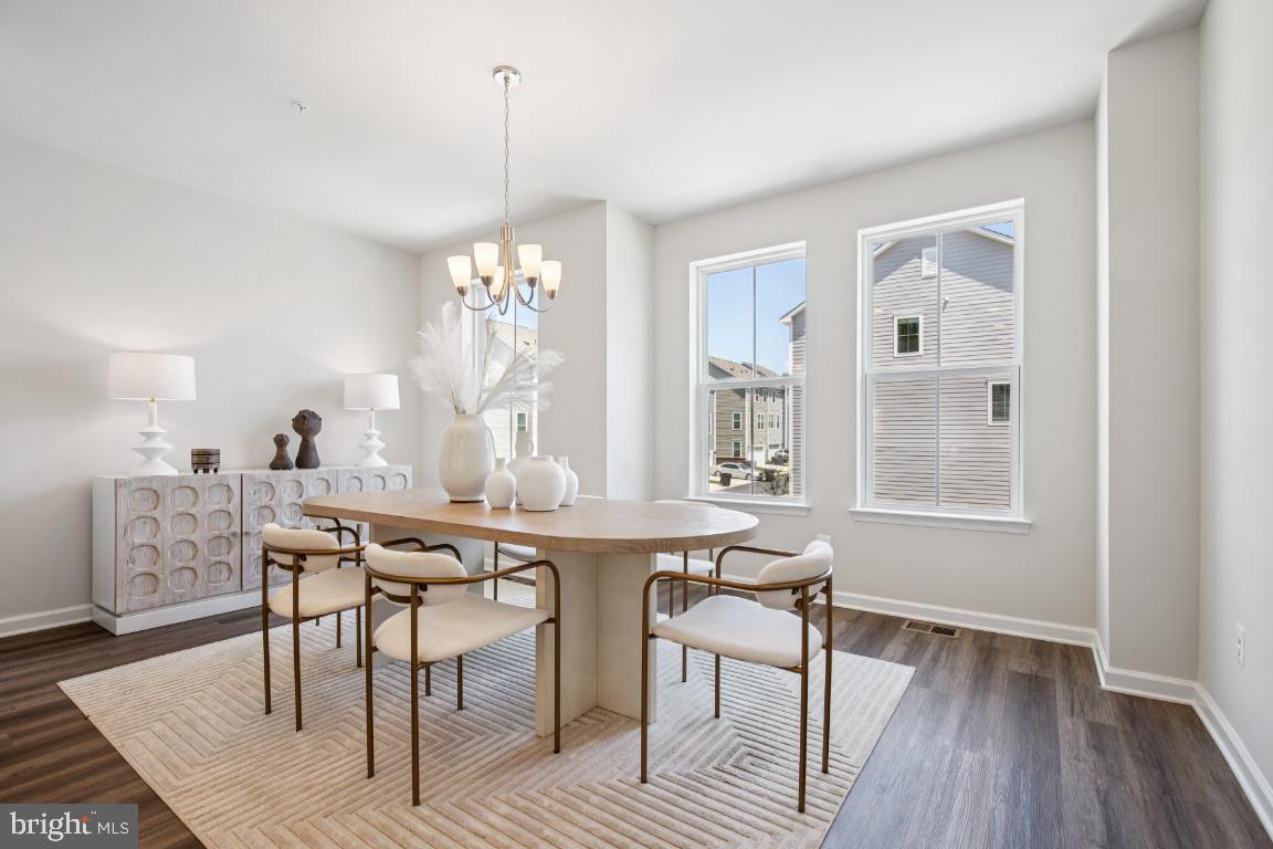 Gorgeous view from all four levels of this beautiful townhome. Immediate delivery. This house is larger than many single family houses. Upgrades galore! Gourmet kitchen. Huge center island. Secondary bedrooms can accommodate queen size bedroom sets. (PHOTOS OF SIMILAR HOME)