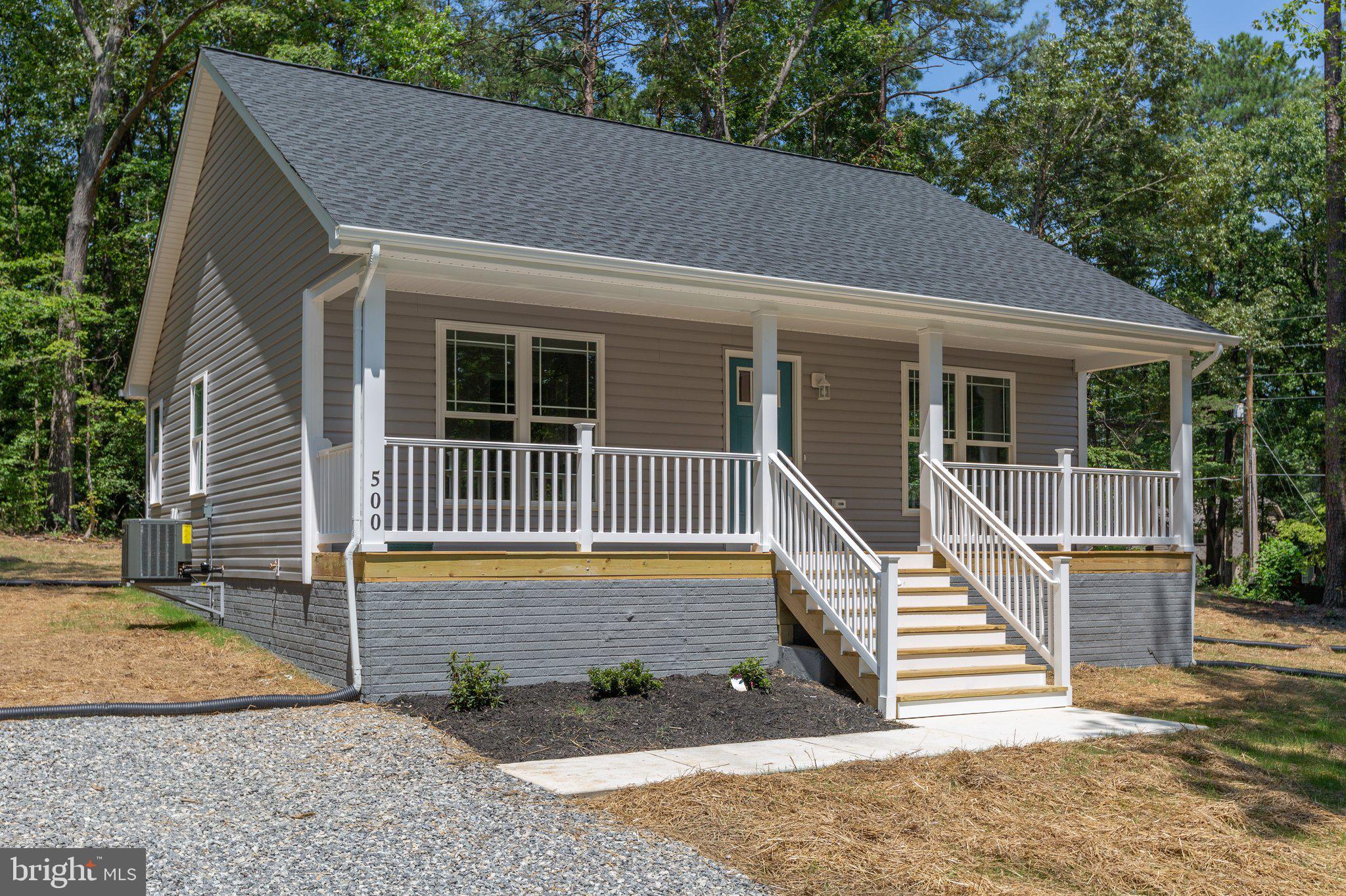 Hamlet Homes introduces the Prescott Model to the Lake Community, Placid Bay Estates. This to be built home features a large front porch, a rear deck, and 2 bedrooms with walk in closet. The luxury bathroom comes with a double vanity, linen closet and a large walk in shower with a tile surround and shower glass door. Enjoy the process of picking your selections, choose your paint color, pick all your flooring, your cabinet colors, and even pick your slab of granite and which kitchen sink you would like to have. On the exterior you choose your siding color and style, your shutter stye and color, your front door style and color, and even if you want black or white gutters and downspouts...down to the last detail, truly making the home your own. Placid Bay Estates is just outside the town limits, only a 5 minute drive to the beach but being just outside the town limits means you are not double taxed! Enjoy this golf cart, lake community with its fishing pier, boat dock, club house, boat storage, swimming and picnic area....call for more details and other models that can be built. Pictures are of previous homes built, this is a to be built listing.