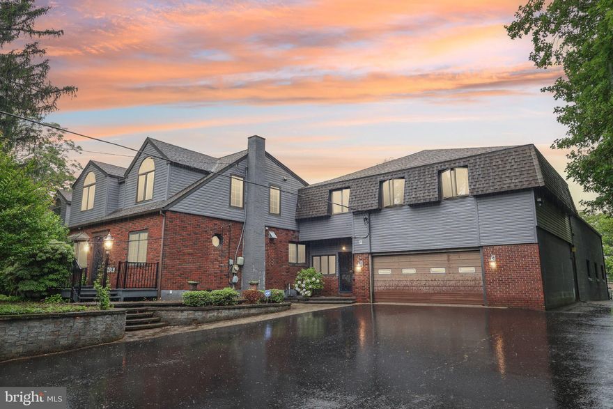 Versatile 3-Bedroom Home on 5.08 Acres with Finished Basement, Elevator, Whole House Generator, Backyard Oasis & Expansive Heated Industrial Garage — Includes Second 2.3-Acre Parcel. Welcome to this unique and wonderfully maintained single-family home, offering the perfect combination of private residential living and exceptional business or hobby potential. Situated on a total of 5.08 acres (including a beautiful second 2.3-acre parcel), this property is a rare opportunity to own a multi-functional estate with room to grow. The main residence features 3 spacious bedrooms and 3.5 bathrooms, thoughtfully laid out for comfort and convenience. The highlight is the expansive primary suite, which truly stands apart with its three walk-in closets, two additional closets, a large private sitting area, and a luxurious full en-suite bath with jacuzzi tub—a private retreat designed for comfort and style. The heart of the home is the chef’s kitchen, equipped with high-end appliances including a Viking stove, a Sub-Zero refrigerator, and a built-in Miele coffee maker—perfect for everyday luxury and entertaining alike. The home also boasts an expansive family room with a striking stone fireplace and an adjoining library, creating a warm and inviting space for gathering, reading, or relaxing. Adjacent is a bright and airy Florida room, offering beautiful views and extra space for year-round enjoyment. An elevator connects all levels of the home, providing easy accessibility for all. The fully finished oversized basement includes a powder room, a large workshop area, a dedicated laundry room, and generous storage—ideal for hobbies, entertainment, or additional workspace. A whole house generator ensures peace of mind, keeping your home running smoothly even during unexpected outages. Step outside to your own backyard oasis. The spacious deck, complete with a built-in grill connected to a direct propane line, is ideal for entertaining or quiet evenings under the stars. One of the standout features of this property is the massive, heated industrial garage—a dream space for business owners, hobbyists, or collectors. This robust structure offers; 15-foot entryway for large vehicles or equipment, 2-ton hoist/crane system, private powder room and three spacious second-floor offices with additional powder room, perfect for administrative work, client meetings, or expanding your creative pursuits. Included in the sale is a second 2.3-acre parcel, giving you even more flexibility—expand your residence, add another structure, or simply enjoy the open space as a long-term investment.  From its expansive layout and luxury features to its unmatched work-live potential, this property is truly one of a kind. Let your imagination take hold—this is your opportunity to create the lifestyle and business environment you’ve been dreaming of.