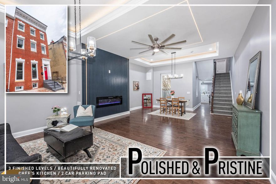 EXPANSIVE POPPLETON RENOVATION! This stunning, full-scale renovation offers an impressive blend of modern luxury and thoughtful design across three spacious levels. Step inside to an inviting open floor plan where the living room showcases an eye-catching electric fireplace with custom trim, and ample space for entertaining. The adjoining dining area flows seamlessly into the gourmet island kitchen, complete with sleek Quartz countertops, stainless steel appliances, a large center island with bar seating, abundant cabinetry, and a sunlit breakfast area—perfect for casual meals. A stylish main-level half bath adds convenience for guests.  The second level offers a well-appointed owner's suite with a generous walk-in closet and a beautifully updated ensuite bath, along with two additional bedrooms that share a modern hall bath. The expansive third-level is a true retreat—featuring a 2nd Owner's suite with a sprawling walk-in closet and a spa-inspired bath with double sinks, a separate glass-enclosed shower, and a soaking tub that invites relaxation.  The lower level provides an unfinished basement offering excellent storage potential. Additional upgrades include zoned heating and air for enhanced comfort and two-car off-street parking—a rare luxury in the city.  Eligible for the $10,000 Vacants to Value grant, this home delivers exceptional value and convenience. Located just steps from the revitalized Hollins Market and only minutes to Downtown Baltimore, UMMC, the stadiums, and major commuter routes—this is urban living at its finest! Call listing agent about $10K in closing assistance available