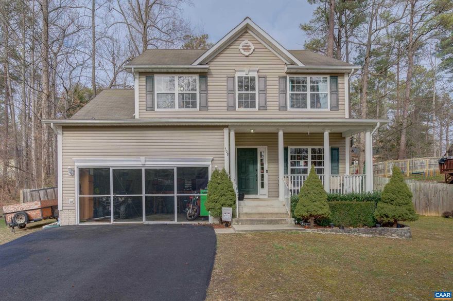 Welcome to this 4 bedroom/2.5 bath gem located in the gated Lake Land Or! With a huge family room and kitchen attached to a separate dining room and office space this home was made for entertaining! Upstairs you'll find 4 bedrooms and 2 full baths. Boasting an oversized master, separate soaking tub, walk-in shower and large closet. Covered front porch, rear decking with fenced in yard and 2 car garage with a screen in option for cook outs! Amenities offered include pool, gym, clubhouse, lake access, boat launch, beaches and more! TRADITIONAL GARAGE DOOR ATTACHED AS WELL.