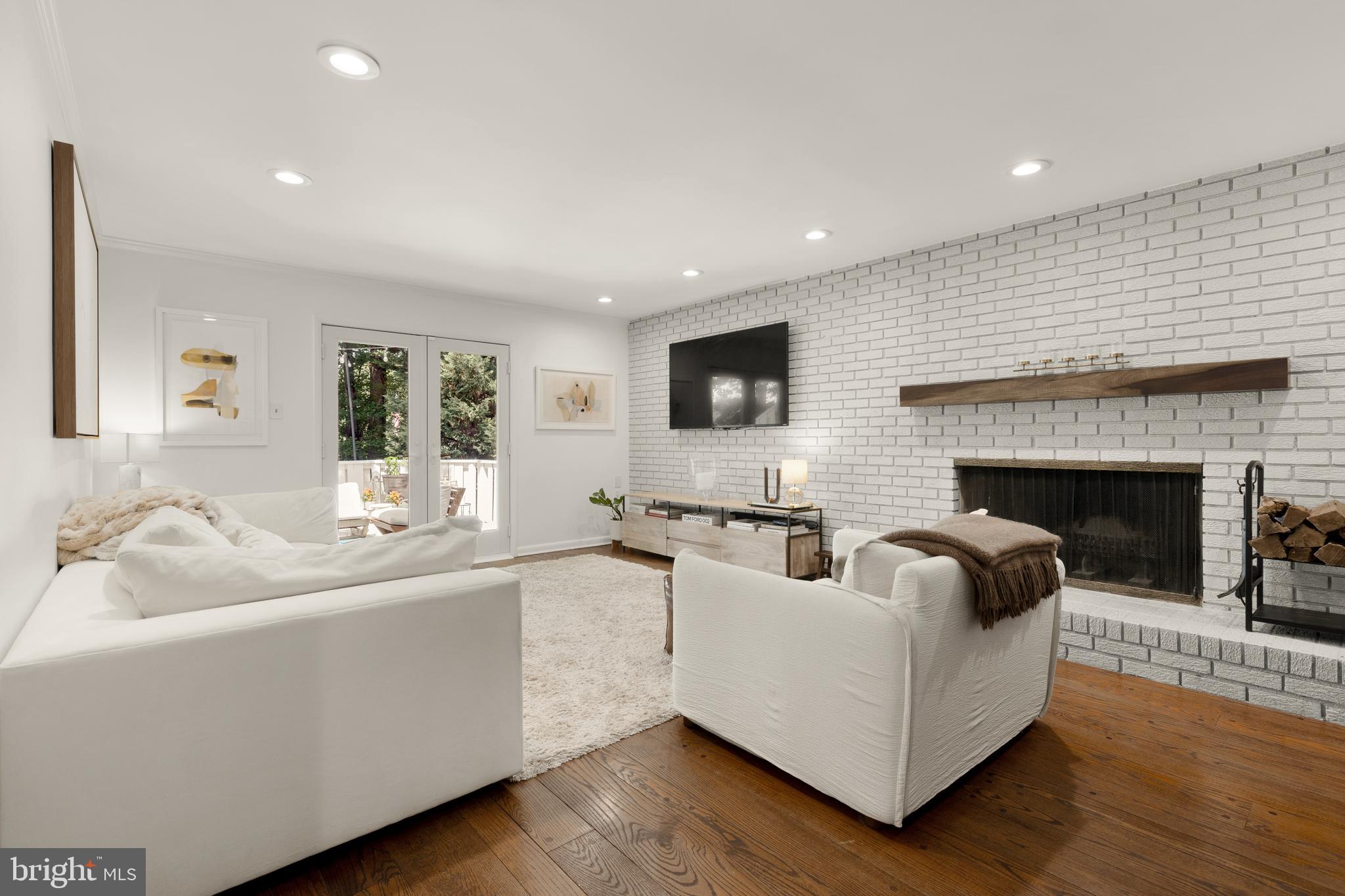 This sun-drenched and spacious gem at 9812 Hill St in the desirable Rock Creek Hills neighborhood of Kensington, MD is a meticulously cared for home offering 5 bedrooms and 3.5 bathrooms over 4,700+ square feet of comfortable living space.
On the main floor you’ll find an open-concept dining and living area flooded with natural light and framed by new oversized windows. Step into the beautifully renovated eat-in kitchen featuring soft gray cabinetry, quartz countertops, a spacious island with seating, and a professional-grade stainless steel range and vent hood - designed for both style and function. This floor is rounded out with a flex office/bedroom space and a formal living room with a cozy fireplace that leads out to a large deck.
Upstairs, you will find four expansive bedrooms, including an enviable primary suite with a custom designed walk-in closet. The en-suite primary bath is complete with a double vanity and separate shower.
The fully finished lower level offers incredible versatility with a stylish kitchenette and another welcoming fireplace in the rec room. Walk out the glass doors to experience the professionally landscaped serene back yard.
With a two-car garage and circular driveway, there is plenty of space for visiting guests. A true oasis nestled in the Rock Creek Hills neighborhood - enjoy easy access to Rock Creek Park's trails and nature, as well as close proximity to downtown Kensington’s shops, cafes, weekly farmers market, and local favorite BabyCat Brewery.