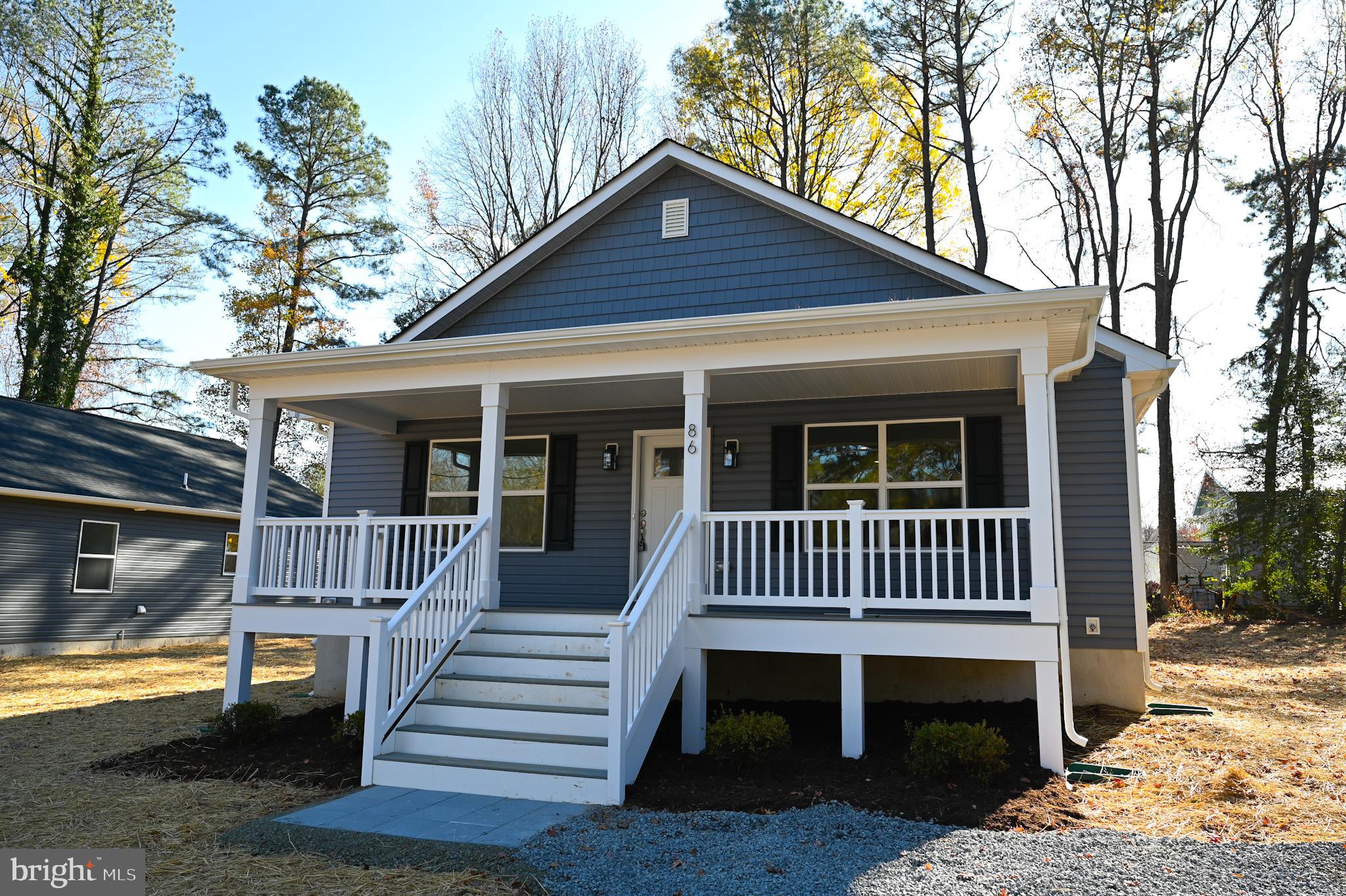 MOVE IN READY - A charming ranch style house for sale in Placid Bay Estates near Colonial Beach, VA. One floor living with flowing floorpan. Kitchen with upgraded quartz countertops, upgraded cabinets, and GE appliances. Pella windows. Upgraded LVP flooring throughout. Custom paint colors. Beautiful low-maintenance Timber-tech front & back porches. Back porch with room for seating or grilling.
