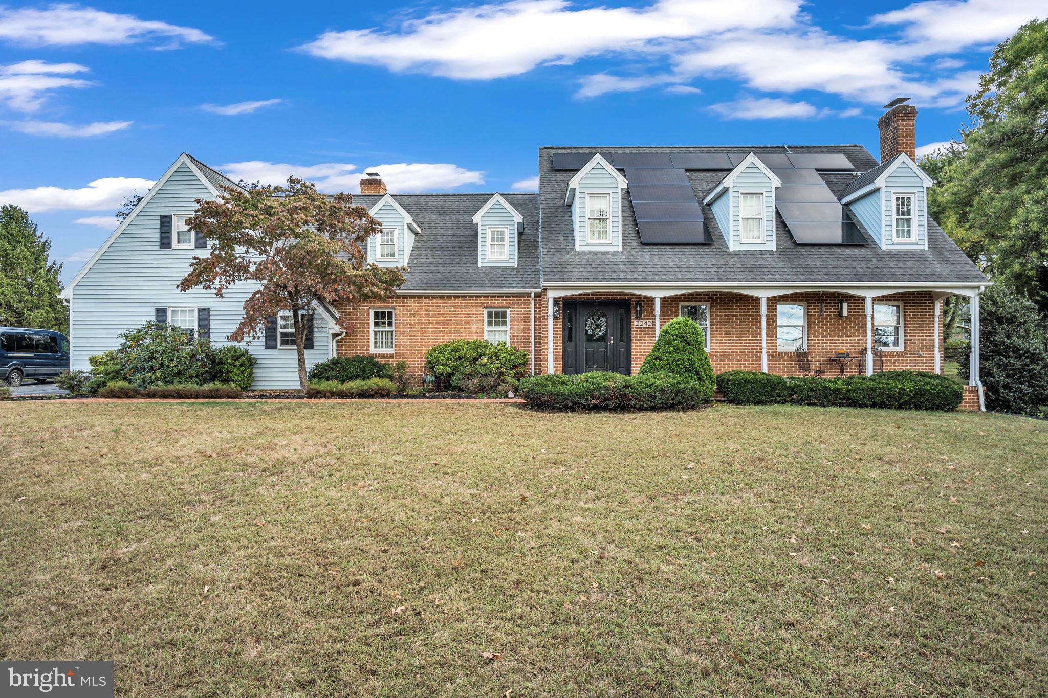 Welcome to 2242 Scotland Road, an impressive and eye-catching brick home where timeless quality meets thoughtful design. From the distinctive grapevine joint brickwork to the abundance of well-appointed spaces, every detail reflects true craftsmanship. With over 3,000 square feet of finished living space, this home offers both function and comfort with a layout that flows seamlessly.
Step inside to a stunning wood-floored entryway that opens into two separate inviting living rooms, each with its own fireplace, perfect for entertaining or cozy evenings in. A sun-soaked four-season room adds warmth and charm, while the open concept kitchen and breakfast nook blend everyday convenience with style. The kitchen boasts an abundance of cabinetry in a timeless color palette, paired with a large designated dining room featuring elegant trim work, calming tones, and generous windows for natural light.
The main level also offers a spacious laundry room with sink, an oversized half bath, and plenty of storage. Upstairs you’ll find four generously sized bedrooms and two full baths, including a primary suite large enough to accommodate a seating area or home office, with incredible closet space to match.
The finished basement expands your possibilities with a fifth bedroom and endless room for a home gym, playroom, or additional living area. A new tankless water heater adds modern efficiency.
Outdoors, the covered front porch is a treat—ideal for morning coffee or relaxing evenings. This is truly a home you won’t want to miss.