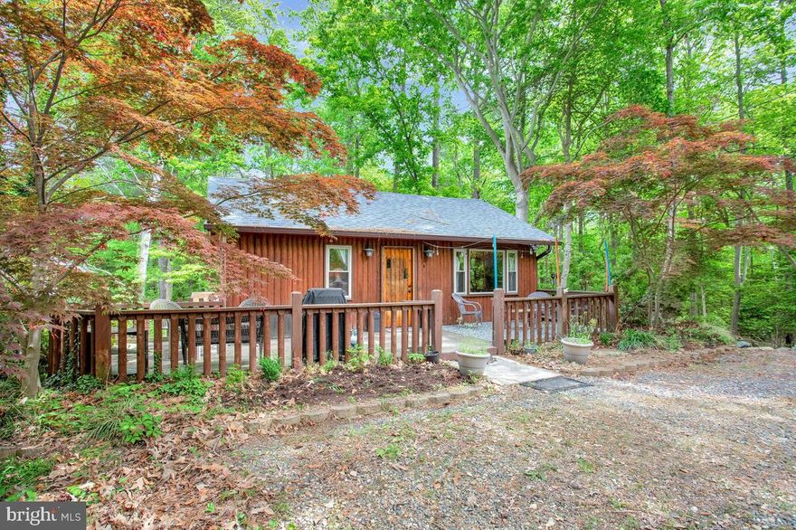 This Adorable 2 Bed, 1 Bath Log Cabin Home Has Just Hit the Market!
This Quaint 850 sq ft Log Cabin is Just the Right Mix of Comfortably Move In Ready and the Most Inexpensive Weekend Beach House You Are Going to Find!  Less Than a 4 Block  Walk to the Private Beach to Enjoy the Water of the Chesapeake Bay! This Charmer has recently upgraded and replaced the Roof with 50 Year Shingles, New Oversized HVAC unit, Inside and Out, a Granite and Maple Kitchen Update and Even a New Energy Efficient Water Heater!  
The Fully Conditioned 4 Season Room off the back of the home was converted from Screened In, to Permanently Finished Off with Windows from Wall to Wall to Enjoy the Serene Wildlife and Nature Around You!  Conviently located in the Chesapeake Ranch Estates, though pushed back off the road and offers quiet, solitude and privacy.
The Community of the Chesapeake Ranch Estates has So Much to Offer too! The Chesapeake Ranch Estates Is Well Know For It's Abundant Amenities, Like 2 Private Community Beaches, a Private Lake with a Kayak Launch, Full Campground Facilities, a Private Airstrip Surrounded by Hangars, Bike Lanes, Roving Security and More! A Commuter Lot is Close By for Quick Travel Into DC and Annapolis and a Short Drive to PAX River NAS and Andrews AFB. Reach Out to Make Your Appointment Today!
This Property is being sold As Is, but is in Wonderful Condition for a home built in 1965. Inspections are Welcome, but no additional upgrades will be made.  FULL DISCLOSURES AVAILABLE and located in the Document Section. Nothing to Hide Here, Just the Best Little Vacation Spot Near the Water, That is Still Affordable! Now Setting Appointments.  Offer Deadline Sunday, May 12th at 5pm.