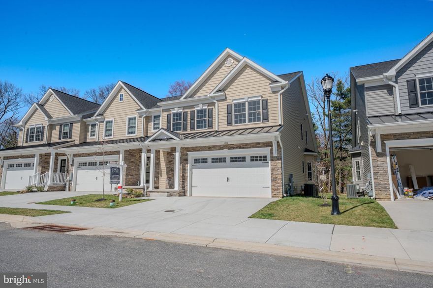 OPEN HOUSE ON SATURDAY 12 TO 3! IMMEDIATE DELIVERY NEW HOME!! NEW 55 & Older luxury End of Group Ready for Immediate Occupancy! Eldersburg's newest 55 & older community,  Doroly Gardens upscale Villas, small enclave of 28 total units when completed! Custom, Quality Built by Patton Homes, building in Carroll County for over 40 years! Builder can make modifications to the unit if necessary! Two by Six exterior construction, Andersen tilt windows & slider. Recessed Fire Sprinklers. First floor features solid 5" wide hardwood floors, Powder room with quartz counters, taller soft close vanity & larger ceramic tile floor. First floor laundry room with large ceramic tile floor. Gourmet kitchen with hardwood floors, island with breakfast bar, upgraded quartz counters, backsplash tile, white Shaker cabinets, soft close doors & drawers, stainless steel appliances include: gas range with oven that includes the Air Fry feature, under counter convection wall oven (2 ovens total) dishwasher & microwave plus garbage disposal. pendant lighting, LED under cabinet lights & recessed lighting. Bay window table area. Great Room with hardwood floors, vaulted ceiling, gas fireplace with marble surround, celling fan, sliding door to covered rear porch. First Floor Owner's suite with hardwood floors, tray ceiling & ceiling fan, ensuite owner's luxury bath with taller double vanity, quartz counters, large shower, linen closet & large walk-in closet also with hardwood floors. Steps to second floor with hardwood treads, white poplar risers to loft area. The huge Loft are is great for additional TV area, studio or office with hardwood floors, ceiling fan and recessed lighting. Located off of the loft is a large separate storage room.  Plus 2 additional large bedrooms, each with hardwood floors, walk-in closet & ceiling fan. Second floor large full bath with double sinks, taller vanity, quartz counters, tub & commode in a separate room, large hall storage closet. Plus there is a huge unfinished basement that can be completed at an additional cost if needed. There is a full bath rough-in, wet bar rough-in, a basement door exit with a couple steps up to yard plus an egress window exit too for extra light in  the basement. The Trane HVAC is 2 zones- heat pump with natural gas back-up heat, public water & sewer. Builder offering $5,000 to closing if you use their recommended lender. 2 end units ready for quick occupancy and more units under roof. Convenient access to Routes 32 & 26. Close to shopping centers and restaurants! Open every Saturday 12 -3 pm or call agent to make an appointment to view units on other days. TAXES LISTED ARE FOR THE LOT ONLY!