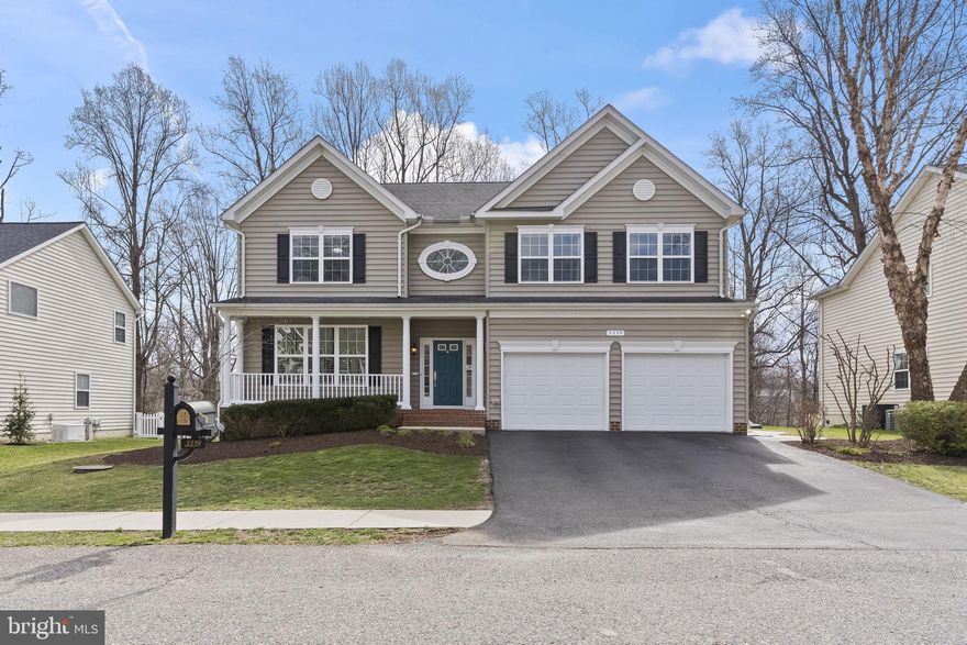 Welcome to 3339 Cannoncade Ct., a beautifully updated multigenerational Colonial home tucked away on a quiet street bordering a cul-de-sac in sought-after Chesapeake Village in Chesapeake Beach, Maryland.   This inviting Colonial is five bedrooms and 3.5 baths.  It has a charming front porch, finished basement and a spacious two-car garage on a private lot with a stunning backyard retreat that includes a saltwater swimming pool.  The primary level has refinished hardwood floors and a dramatic staircase.  You will find an inviting foyer, home office for working at home, formal dining room, and sitting room.  The open-concept kitchen, informal dining room, and family room serve as the heart of the home.  The kitchen features granite countertops, a center island, gas cooktop, wine fridge, and generous pantry storage. The adjoining family room with gas fireplace is a warm, comfortable space to relax.  The spacious main floor laundry room connects to the garage and includes additional storage and a utility sink for everyday convenience.  Upstairs, there are four generous bedrooms.  The spacious primary suite functions as a private retreat with a spa-style bath, soaking tub, oversized shower, double vanities, and large walk-in closets.  The three remaining bedrooms offer plenty of space.  The fully finished basement significantly enhances the home’s appeal for multigenerational living. This level offers a private entry, expansive living area, bedroom, full bath, and kitchenette with exceptional flexibility for extended family, guests, or private living quarters.  Major updates provide comfort and peace of mind, including two new HVAC systems (2025), refinished wood floors, and new carpet in much of the home. The home also features fresh paint throughout, a tankless water heater, public water, and public sewer.
Outdoor living is a true standout feature. The fenced backyard which backs to the woods, offers space, privacy, and usability seldom found in the area. Extensive hardscaping, a large deck, and an in-ground saltwater pool create a private outdoor retreat perfect for entertaining, relaxing, and enjoying Maryland’s warmer months. The fenced yard is ideal for pets, and the neighborhood is known for its pet-friendly atmosphere.  This home is located one mile from Bayfront Beach (formerly Brownies Beach) where you can access a boardwalk and walk along the Chesapeake Bay.  Additionally, Beach Elementary School is only 1.3 miles away.  Residents also enjoy waterfront dining, marinas, shopping, farmers markets, and year-round community events. Commuters benefit from easy access to Route 260 and Route 4, providing convenient travel to Washington, DC (37 miles), Annapolis (31 miles), Joint Base Andrews (28 miles), and Coast Guard & DHS Headquarters (34 miles).  This home perfectly blends comfort, convenience, and style in one of the area’s most desirable communities, all just steps from the Chesapeake Bay.  Reserve your showing today.