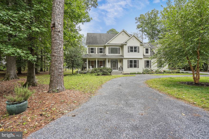 Welcome to the rare offering in Oaklands. With 4 bedrooms, 2+/- acres and nearly 4,000 sq.ft. this home offers room to entertain both inside and out. You are immediately greeted with a newly renovated kitchen with custom cabinetry and quartz tops which is accented with a wet bar, beverage refrigerator and ice machine. There are custom lockers that lead you into a large butlers pantry with 2 additional ovens when you are really entertaining. The open plan leads into the living room with wood stove and access to the large screen porch. Upstairs there are 4 gracious bedrooms one with a loft that is a perfect spot for an additional entertaining area. There is a huge bonus area above the garage that also has access to a massive attic for additional storage. There is a 3 zoned Sonos sound system that covers the house and the back yard and barn.   The back yard is a special place with a stone patio, 30x40 pole barn that is demised into two sections. A party barn on one side and a utility garage on the other. Seller believes there is room for a pool. Oaklands also has a community beach area and kayak launch as well as 2 community docks subject to availability.