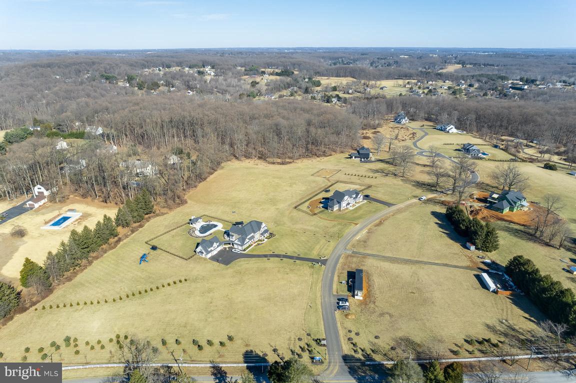 Take advantage of the Danleigh Design/Build format which provides for true customization and allows you to build a one-of-a-kind custom home ranging from two story traditional, rancher design, or a plan with first floor owner’s suite and 2nd floor living as well. Luxury Danleigh Home Features · Beautiful Architectural Elevations with Standard Stone to Water Table· Standard 2 Car Side Entry Garages (Optional 3+Car)· Luxury Kitchen w/ Standard Quartz Countertops & Standard Island· Upgraded Maple Cabinetry with Soft Close Doors and Drawers· Stainless Steel appliance package to include Chimney Style Hood, gas range, Side by Side Refrigerator and quiet stainless steel dishwasher· Hardwood Floors on the Entire Main Level· Standard Oak Tread Staircase · Standard Gas Fireplace in the Family Room just to name a few. Hahn’s Meadow offers FIVE (5) remaining estate size homesites for you to build your CUSTOM dream home! Hahn's Meadow is "tucked away" off of Chapman Rd-yet convenient to major commuter routes. On-site sales center is open from 11am-4pm Thursday thru Monday, or by appointment. *Photos are of previously built Custom Danleigh Home.