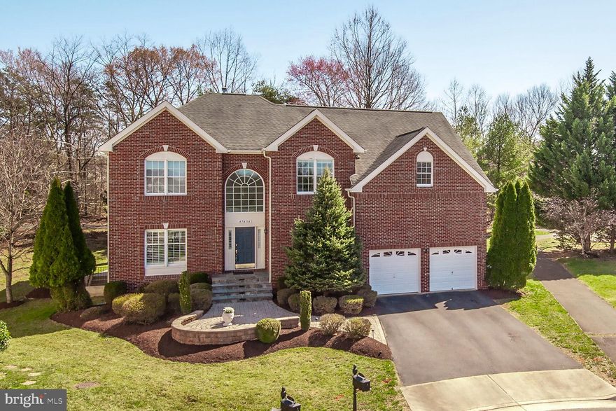 Nestled in a community near golf courses and parkland in Potomac Falls, this Toll Brothers-built home offers luxury, space, and functionality across three beautifully finished levels. Facing west, the home is filled with natural light and designed for both everyday comfort and grand entertaining. 

The upper level features a stunning primary suite complete with a spacious sitting room, walk-in closet, and a spa-like ensuite with a separate soaking tub, private water closet, and dual vanities. Two additional bedrooms share a Jack and Jill bath, while the fourth bedroom boasts its own private ensuite. 

On the main level, the two-story family room creates an inviting gathering space, complemented by a large open kitchen with a wall oven, a formal living and dining room, and a private study. A dual staircase offers both elegance and convenience. 

The fully finished lower level provides incredible flexibility, featuring a full bath and multiple rooms that can be used as a home office, game room, yoga studio, or anything else to suit your lifestyle. Step outside to enjoy a serene backyard that backs to a walking path and mature trees, offering both privacy and a connection to nature. This exceptional home combines timeless architecture with modern amenities in an unbeatable location.