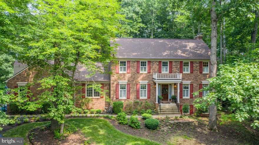 Welcome home! This private retreat awaits its new owners. Boasting over 3,500 sq.ft. of living space on 3 levels with a two car garage, this spectacular home sits on over 2 acres with plenty of greenery, mature trees, and wildlife. Your new home features 4  bedrooms, 2 full and 1 half baths, an OFFICE on the main level, separate FORMAL DINING and LIVING ROOM rooms, an OPEN CONCEPT kitchen that flows into the large family room. Enjoy your home year round, inside or out!! 

Wonderful backyard offers a doggy lot and a small garden to grow your favorite plants and herbs.  Throw a ball or bird watch during the spring. In the summer, your extensive deck makes grilling and entertaining with friends a breeze! In the fall, roast marshmallows outside at your firepit on the custom patio by Merrifield Garden Center. Then cozy up next to your wood burning fireplace during the winter. This classic Colonial has been updated with a custom kitchen (white solid maple cabinets and a built-in hutch), granite counters, light fixtures, ceiling fans, and brushed nickel hardware throughout, stainless steel appliances, a newly stained deck, and completely updated master bath. Custom hardwood floors in Living and dining rooms. Plantation shutters, custom window treatments, and new windows on the rear main level of this home. HVAC has been routinely maintained under contract. TRANE WHOLE HOUSE AIR PURIFICATION SYSTEM, GUTTER HELMET, Whole house water purification system, & so much more!!! In addition to being near the Occoquan (views for 3 of four seasons just across the street), you will also be close to parks, golf courses, and great shopping! Picnic in the Cannon Bluff Park, right on the Occoquan with a boat ramp, dock, canoe storage, picnic tables and more!