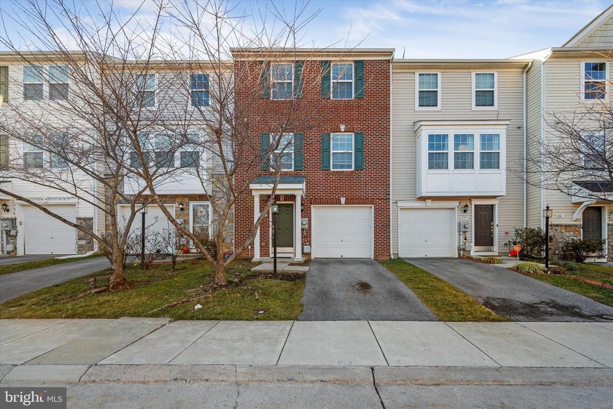 This Fairfax Crossing townhome with attached garage has been updated and improved within the last two years and is move-in ready. LVP flooring on the first two levels gives the property a brand-new feel. Recent updates also include stainless steel appliances, new washing machine, water heater, ceiling fans, window blinds, back door, and a 6-ft vinyl privacy fence. The open-concept kitchen features tall wood cabinets, an island with seating, and a peek-through to the family room. Dining room located off of the eat-in kitchen. The master bedroom has a walk-in closet, luxurious jetted tub and separate shower. Fully finished lower level with direct walk-out access to your fenced back yard. Proximity to restaurants, shopping, and commuter routes is ideal, and the neighborhood amenities include playgrounds and sidewalks. These units are going quickly - make this one yours today!