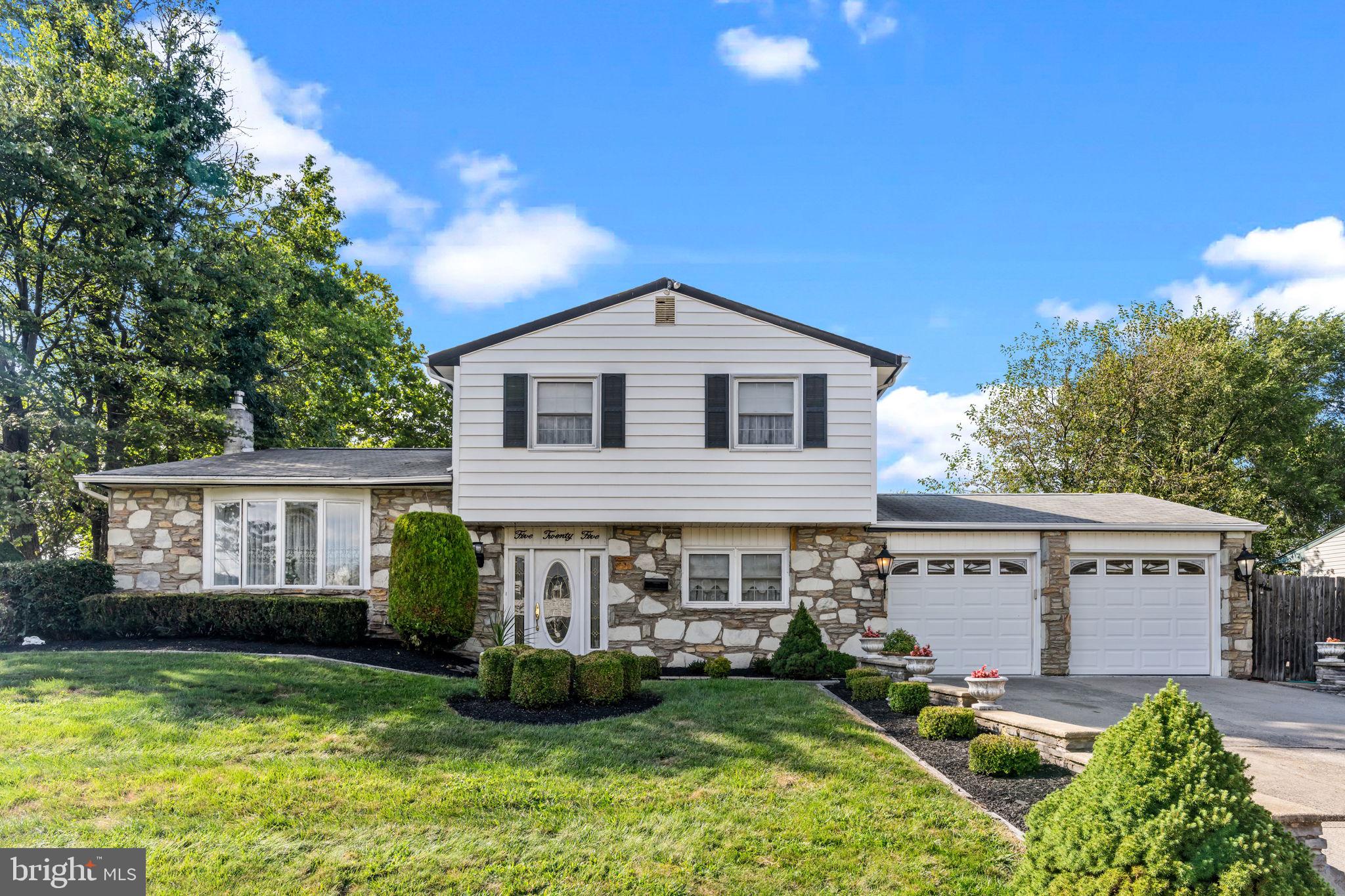 Welcome to this beautifully maintained corner property, offering fantastic curb appeal with stone and vinyl siding, mature landscaping, and a two car garage with a concrete driveway. Step inside to a versatile floor plan that begins with an office/bedroom that can serve as a third bedroom. A convenient laundry room with access to the garage and a half bath with a pedestal sink complete the entry level amenities. The spacious family room is a true focal point featuring a full wall gas fireplace and sliding glass doors that lead to a screened in Florida room, perfect for relaxing or entertaining. The kitchen boasts abundant cabinets and a gas stove, while the nicely sized dining room and living room provide plenty of space for gatherings. Upstairs, the main bathroom is fully tiled, and the enlarged master bedroom offers both a huge walk-in closet and an additional closet. The master bath is also tiled and features a pedestal sink. A generously sized second bedroom includes double closets, ensuring plenty of storage space. Enjoy your private backyard retreat with a vinyl liner in ground pool, attractive landscaping, and fencing for added privacy. A basement provides additional storage and flexibility. Newer heater and central air. This move in ready home combines comfort, style, and convenience inside and out.