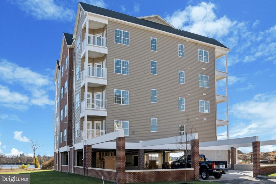 Welcome to the Condos at Radcliffe Court on the Delaware, Bucks County’s premier new-construction condominium community. This listing is for a fully finished move-in ready unit complete with a tremendous amount of upgrades just waiting for you to call this place home!

This exceptional development features 96 affordable luxury residences and represents the largest residential development ever built in Historic Bristol Borough. Building upon an already successful townhome neighborhood, the Condos at Radcliffe Court uniquely blends small-town borough charm with modern city living.

Each thoughtfully designed condominium offers 2 bedrooms and 2 full bathrooms, highlighted by an open-concept layout that seamlessly connects the living room, dining area, and kitchen—ideal for both everyday living and entertaining. Buyers may personalize their home by selecting from a wide range of hardwood flooring, tile and carpet options in addition to the many different choices for kitchen cabinets, countertops and backsplashes.

The spacious U-shaped kitchen features beautiful cabinet selections, granite countertops, and a stainless-steel appliance package, creating a stylish and functional heart of the home.

The primary suite includes generous closet space and a private en-suite bathroom with a double-bowl vanity, custom tile shower, and ceramic tile flooring. The second bedroom is conveniently served by a hall bathroom that also functions as a guest powder room, complete with a one-piece fiberglass tub/shower combination and matching cabinet and countertop finishes.

Every residence is equipped with energy-efficient HVAC systems, LED recessed lighting throughout, elevator access to every level, and one reserved parking space per unit. In addition to covered parking beneath each building, residents enjoy ample additional parking throughout this section of the community and in the adjacent lot.

The development is nestled on the banks of the Delaware River and positioned along the 4.5 mile trail that runs throughout this incredible town. Just minutes from I-95, the PA/NJ Turnpike, SEPTA and NJ Rail Lines, this is the most centralized development in Bucks County!

With the community already being 25% sold out, don’t wait for the weather to break to take advantage of these incredible opportunities along the Delaware River!
INTERIOR PHOTOS COMING SOON!


Sales Office Hours:

Monday–Saturday: 10:00 AM – 4:00 PM

Sunday: 11:00 AM – 4:00 PM