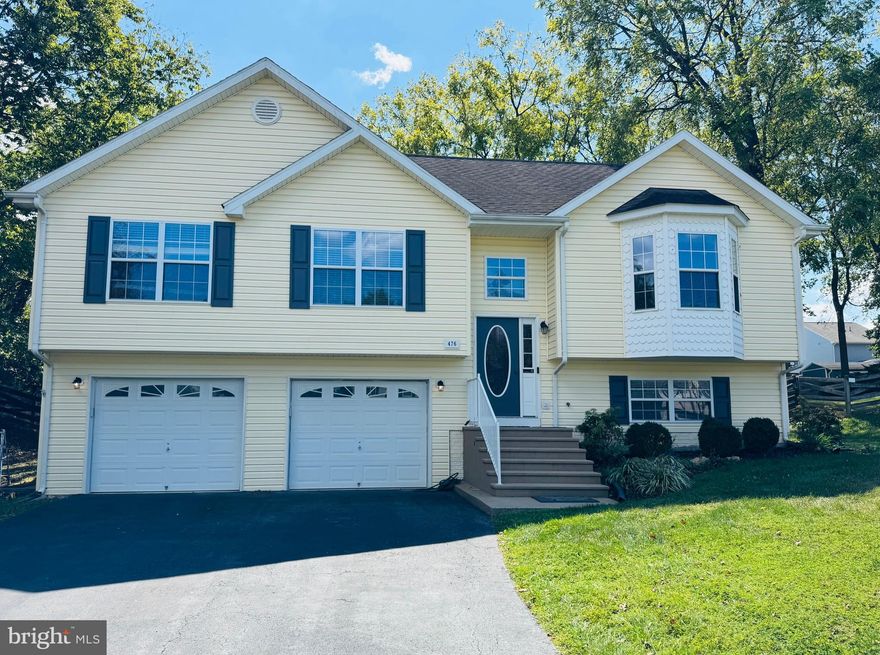 Spacious split-level home with fresh paint, refinished wood stairs, and a huge fenced backyard with a deck and mature trees. 3 bed/3 full bath. Vaulted family room ceiling and open-concept kitchen/dining. Lower level has a large rec room and laundry facilities. No HOA! Walking distance to shops and restuarants. Great commuter location right off Rt. 9.