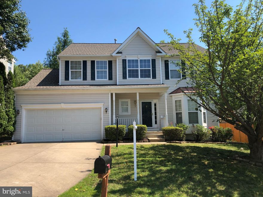 AMAZING PRICE BELOW MARKET FOR 3 FINISHED LEVELS & LESS THAN 5 MINUTES TO I-95! This gorgeous 4 BR, 3.5 Bath home is nestled in the sought after peaceful community of Perry Farms away from the busyness of traffic and congestion; less than 2 minutes to the new commuter lot, walking distance to new state of the art Moncure Elementary School! Large eat-in kitchen with separate dining room. Retreat to the large owner s suite after a long day at work and enjoy the soaking tub!   The Fully finished basement is great for entertaining in the recreation room and has a full bath! Walkout to the huge Deck onto the flat fenced yard with privacy trees!!    Newer carpet and paint. Walking distance to grocery store, cleaners, shopping, Home Depot, Lowes, restaurants, spa and more!! Close to Quantico MCB!  Easy commuting options to DC, Arlington, Pentagon, Crystal City areas.