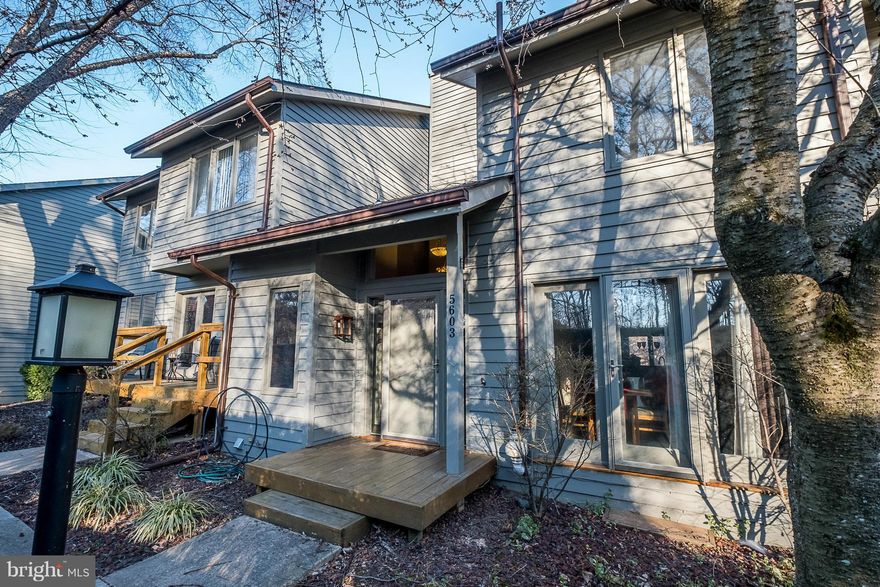 BEAUTIFULLY RENOVATED TOWN HOME IN THE HEART OF COLUMBIA! Gorgeous kitchen, updated baths, gleaming hardwoods & stone fireplace. Relax in the spa-like master suite, with separate office or sitting room, W/I closet and luxurious bath, walking out to one of two private decks. Quiet, tranquil area in the back of the community. Tennis courts and ponds highlight this sought-after neighborhood! WOW!