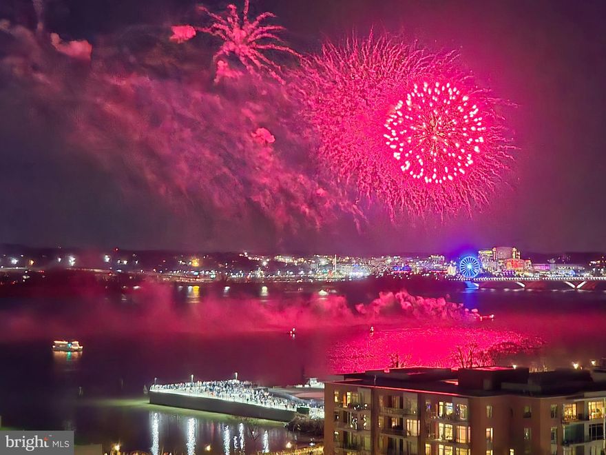 Beautifully remodelled top floor penthouse 1-bedroom, 1-bath condo with rare, unobstructed panoramic views of the Potomac River, National Harbor, MGM, and sunsets over the Masonic Temple. Coveted corner unit with no neighbors on either side. This bright, spacious home features a beautifully renovated bathroom with marble tile, custom frameless shower door, upgraded cabinetry, lighting, flooring, and fixtures. The entire unit was freshly repainted in 2021, and the kitchen includes repainted cabinetry, stainless steel appliances, gas cooking, brand new microwave/ air fryer combo and a garbage disposal. Thoughtfully added custom lighting—including living room sconces, a dining chandelier, and bedroom sconces—creates a warm, upscale ambiance. Elegant glass French doors with vintage knobs and custom window and door shades elevate the space even further. Enjoy an open floor plan, walk-in closet with custom built-ins.  A private balcony with no adjacent balconies, and breathtaking sunrise and sunset views. A valuable assigned corner garage parking space (worth $10–15K and rentable/sellable) is included. All utilities including gas, electricity and water are included (except wifi/cable) are covered in the condo fee. The building offers daytime concierge service and a rooftop terrace with sweeping views of DC. The best view in town to watch the Old Town/DC fireworks! Located just steps from Old Town’s shops, restaurants, the waterfront, Metro, Harris Teeter/Trader Joe’s, bike paths, and minutes to Washington DC and National Airport—this exceptional condo offers unmatched views, upgrades, and convenience.