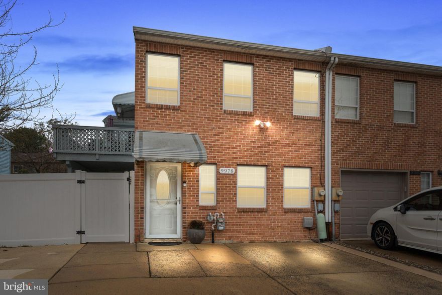 Welcome to this spacious and inviting end-unit home offering 4 bedrooms, 2 full bathrooms, and a versatile layout perfect for comfortable living and entertaining. Situated on a desirable corner lot, this property features 4 private driveway parking spaces plus additional street parking, making it ideal for hosting guests or accommodating multiple vehicles. Inside, you’ll find natural hardwood flooring on the main level and carpeting in the bedrooms and lower family room for added warmth and comfort. The main level includes two bedrooms, a full bath, a convenient laundry room, a utility room, and a generous family room with sliding glass doors leading to the fully fenced backyard. Perfect for relaxing or entertaining outdoors.
The second floor offers a bright and open living space featuring a living room, dining area, and a stylish kitchen with white shaker cabinets, granite countertops, and a gas stove. Step out onto the side deck from the dining area to enjoy your morning coffee or grill on summer evenings. Two additional bedrooms and a full hall bathroom complete this level. As a bonus, the backyard includes a full-size shed with electricity, offering endless possibilities for storage, a workshop, or even conversion into a creative studio or additional living space. Don’t miss this rare end-unit gem with ample parking, flexible living spaces, and room to grow—inside and out! Schedule your private showing today!