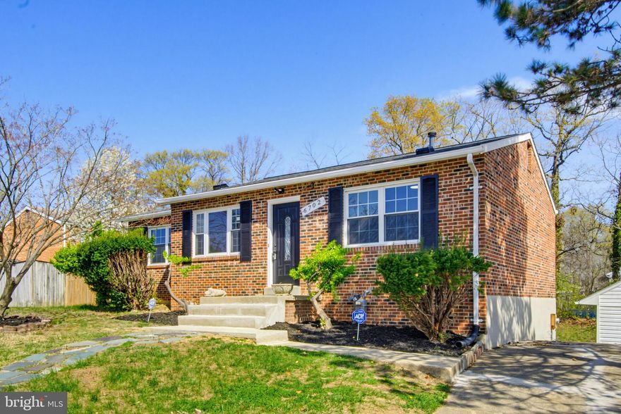 Beautifully updated rancher in District Heights.   New kitchen cabinets and  quartz countertops.  New Stainless steel appliances.  Refinished hardwood floors on main living area.  Waterproof LVP in bedrooms and lower level.   Upgraded bathrooms with gorgeous tile work.  Updated deck with new deck boards and rails.  Spacious storage shed in the rear.  New gas furnace and ac unit.  New gas water heater.