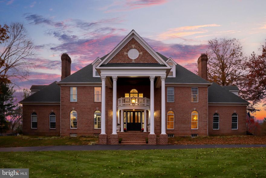 Live authentically. Stately Brick Manor Home set on 5.14 acres in the coveted Phoenix area and esteemed Hereford Blue Ribbon school district. This glorious Georgian estate welcomes you with sculpted grounds leading to luminous, inviting interiors. Elegant living spaces flow effortlessly into a renewed culinary haven, showcasing modern marble floors and new state of the art appliances and stunning granite. The cooking space opens to a glassy sunroom and a dramatic great room … soaring ceilings and brick fireplace wall visually anchors the space-one of five inviting hearths throughout. The primary suite serves as a serene retreat, complete with a spa-inspired bath, ample walk-in dressing rooms with a private sitting area and porch. Incredible third floor space offers a plethora of possibilities with full bath. The lower level offers a blank canvas for your vision, ready to transform into a home theater, gym, or play space. Outdoors, a glimmering custom saltwater pool with waterfall, spa, hot tub, and koi pond creates a private oasis, complemented by a pool house with gathering space, kitchenette, and alfresco grilling area. Evening tennis beneath the lights adds a lively touch, while six garage bays—three attached and three beneath the pool house—cater to the avid collector or enthusiast. A resort lifestyle awaits. Close to Hunt Valley and the 83. Verizon Fios Internet. Cultivate your existence. The art of uniting human and home.