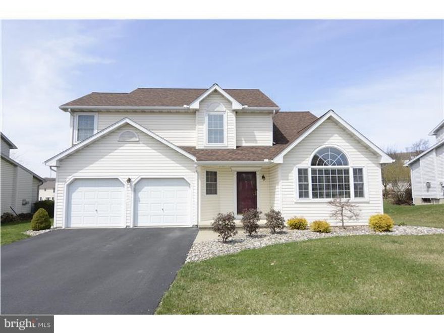 Pride of ownership is evident in this 4 bedroom, 2   bath gem situated in the sought after development of Carriage Point in the Kutztown School District. You will immediately notice the mature landscaping offering great curb appeal. Upon entering you will be enamored with the layout of this home, which boasts vaulted ceilings, beautiful center staircase and floor to ceiling stone wall with natural wood mantel, which offers a pellet stove as a secondary heat source, not to mention the beauty that it adds to this living room. The 27 handle eat in kitchen offers granite countertops, tile floor and backsplash, with all appliances remaining for the new owner, and sliders to the rear deck. Large family room just off the kitchen makes for a great place to relax with the entire family after every meal. Convenient first floor laundry and half bath complete this level. Upstairs you will find 4 generous size bedrooms including the large master bedroom with a walk in closet and private full bath. The angled walls, open floor plan and d cor give this home a fresh modern feel with neutral colors throughout. The roof was replaced with architectural shingles in 2013. This home is turn-key and located on a quiet, friendly development. Home will not last long at this price in this condition! Call today to schedule a private showing.