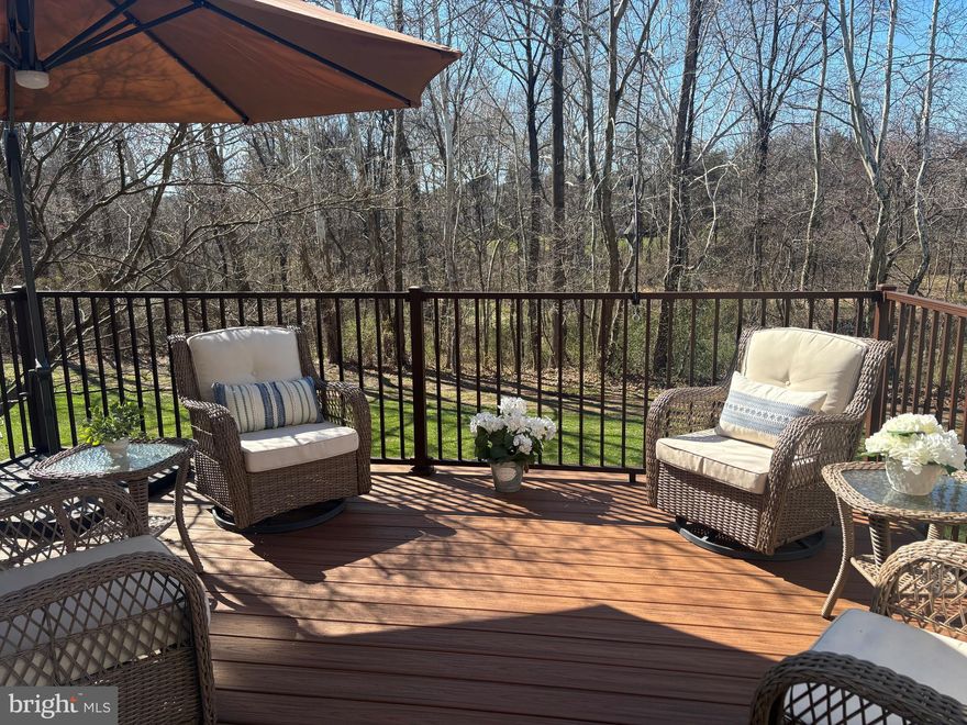 COMING SOON! Welcome to 14525 Four Chimney Drive — one of the largest townhome models in the highly desirable Newgate community, offering exceptional indoor and outdoor living. This 3‑bed, 2.5‑bath home features a spacious 1,444 sq ft above‑grade footprint plus a walk‑out lower level, creating nearly 2,000 sq ft of usable space. Backing to a peaceful community park with a creek, the setting provides rare privacy and a natural backdrop that’s hard to find in Centreville.
Recent improvements include fresh paint on the main level, upper and lower hallways, primary bedroom, and baths; new LVP flooring in the basement (2025); a new refrigerator (2025); a Trex deck (2022); hardwood flooring on the main level (2021); updated siding and front door (2018); and a newer primary bath toilet (2018).
The main level offers an open living and dining area with great flow to the new Trex deck and fenced backyard — perfect for relaxing, entertaining, or enjoying the wooded park views. Upstairs, you’ll find three generously sized bedrooms and two full baths. The walk‑out lower level provides flexible space for a rec room, home office, gym, or guest area, with direct access to the patio and yard. Fresh paint and professional cleaning make this home move‑in ready while leaving room for the next owner to personalize and add value over time.
Newgate is known for its quiet streets, mature trees, community pool, tennis courts, and unbeatable access to shopping, dining, commuter routes, and top Fairfax County schools. A wonderful opportunity to own a spacious, well‑located home in one of Centreville’s most sought‑after neighborhoods. Professional photos 3/19.