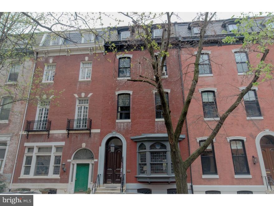 Style and Substance on Delancey Place - one of Rittenhouse Square's most sought after blocks. The refined elegance of this 4 story, 4-family townhouse on Delancey Place is proudly proclaimed by its brick facade with leaded bay windows and double entry doors. At approximately 5,050 square feet, the house is currently used as a 4 units, or may be returned to its grand, single-family townhouse origins. The home offers three upper units a four bedroom, studio, a one bedroom and an entry level owners unit with one car parking. The owners' unit offers all the gorgeous details that one hopes for in a late 1800s Victorian with moldings, intricate floors, and gorgeous carved mantle fireplaces, among other details. The home and lot measure 22 x 100 allowing flexible use options for its next owner.