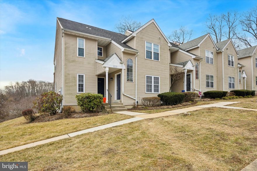 Welcome to this immaculate first-floor condo in the sought-after Ballinahinch community! Step inside to discover a bright and inviting kitchen featuring updated luxury vinyl plank flooring, a convenient peninsula for seamless flow into the dining and living areas, and all appliances included. The spacious living room offers cozy carpeting, a fireplace, and sliding glass doors that open to a private deck—perfect for enjoying beautiful hillside views of the community.

The primary bedroom boasts plush carpeting, a generous walk-in closet, and a primary bathroom with a shower/tub combo. A well-sized second bedroom, a full hall bath with a walk-in shower, and a laundry closet with a stackable washer/dryer complete the main level. Additional conveniences include a linen closet, a coat closet, and interior access to a full, unfinished basement—offering endless possibilities for storage or future living space.

Brand new hot water installed in 2024. This condo offers maintenance-free living at it's finest and is ideally located in the Penn-Delco School District, just minutes from shopping, dining, Wawa Station, major routes, and PHL Airport. Don’t miss this opportunity—schedule your tour today!