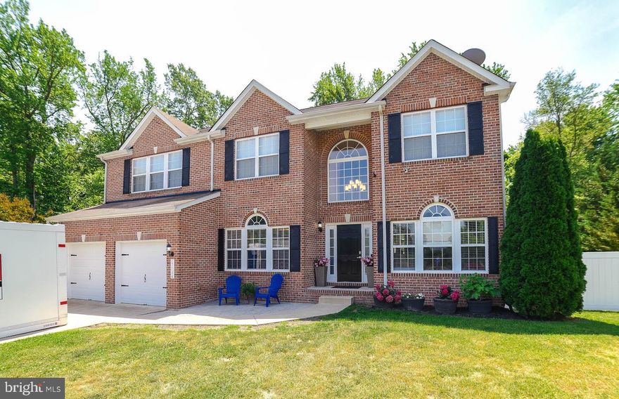 LOCATION, LOCATION, LOCATION, BEAUTIFUL CUL-DE-SAC, 2 STORY BRICK COLONIAL, FENCED YARD.  THIS AMAZING HOME HAS LOW TAXES, BROADBAND ( WHICH MANY AREAS IN KG DO NOT HAVE) JUST OVER THE BRIDGE. CLOSE TO SHOPPING, RESTAURANTS AND COMMUTER LOTS.  THIS HOME HAS 3 LEVELS OF LIVING SPACE. THE FIRST 2 FLOORS HAVE ALL HARDWOOD FLOORS,  A 2 STORY FOYER, DEN, DINING ROOM AND  FAMILY ROOM. THE FAMILY ROOM BOASTS A BEAUTIFUL GAS FIREPLACE,  UPDATED, UNIQUE RUSTIC CEILING FAN, OPEN STAIRCASE AND MORE. THE KITCHEN IS WIDE OPEN WITH LOTS OF TABLE ROOM,  AN ISLAND WITH PENDANT LIGHTS,AND DOUBLE CORNER SINK. THE BASEMENT IS FULLY FINISHED WITH A HUGE GREAT ROOM, FULL BATH, LAUNDRY ROOM AND SEPARATE BEDROOM/HOBBY ROOM. UPSTAIRS THE MAIN BEDROOM IS A DREAM SUITE.  FROM THE CATHEDRAL CEILINGS AND EXPANSIVE OPENNESS, YOU WILL BE ABLE TO ESCAPE ALL YOUR TROUBLES AND REJUVENATE.   THE MAIN BATHROOM HAS JUST BEEN COMPLETELY RENOVATED. IT HAS A MODERN, DEEP SOAKING TUB, THE STANDALONE TILE SHOWER WITH DUAL SHOWER HEADS AND INSET SOAP SHELVES IS MAGNIFICENT; YOU WILL HAVE PLENTY OF ROOM FOR ALL OF YOUR CLOTHES IN THE  HUGE  WIC WITH CUSTOM ORGANIZERS.  ALL OF THE BEDROOMS HAVE HARDWOOD FLOORS, CEILING FANS AND MORE.   STEP OUT THE FRENCH DOORS IN THE KITCHEN TO THE  DECK AND BACKYARD. THIS PRIVATE TREE LINED YARD IS SO QUIET AND RELAXING. THIS HOME HAS SO MUCH TO OFFER. DON'T WAIT IT WON'T LAST LONG.