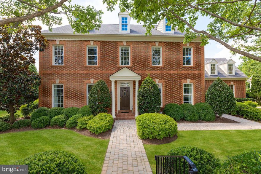 Fabulous location just one light to DC and backing to Linway Terrace Park. Beautiful all-brick colonial with an inviting open floor plan. The main level features a gorgeous family room with a gas fireplace & opens to the gourmet kitchen and sunny breakfast room. The master suite features a fireplace, breakfast bar, sitting room, his-and-hers walk-in closets and a luxurious master bath. The third level offers a bedroom suite/bonus room with the lower level featuring a recreation room with a fireplace, game room, wet bar and exercise room. There is a spacious in-law/au pair suite over the garage with a private entrance. The picturesque yard offers beautiful hardscaping that includes a koi pond with a waterfall, stone patio and a rear deck. Short walk to Chesterbrook Shopping Center. Shows beautifully! Minutes to D.C.