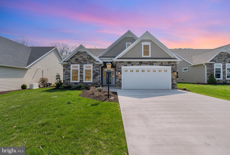 This beautifully maintained 3-bedroom, 2-bath home offers a spacious layout and maintenance-free living in the desirable Penn National Golf Course community. Located on the golf course, this property features a covered back patio—perfect for relaxing with your morning coffee or enjoying evening views. Inside, you'll find an open layout with plenty of natural light and a generous attic space for storage or future customization. A 2-car garage provides convenience and additional storage. Enjoy all the perks of this vibrant, amenity-rich community: lawn care, snow removal, and trash pickup are covered by the HOA. Residents also have access to 36 holes of golf, tennis and pickleball courts, an outdoor pool, yoga classes, and an on-site restaurant and bar. Don’t miss your chance to tour this charming home—schedule your showing today!