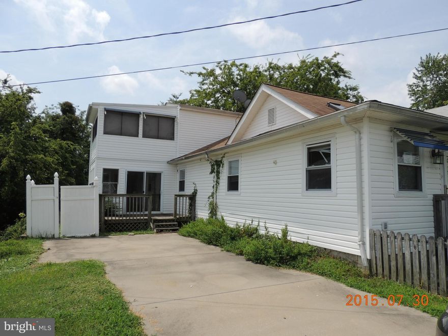 "Downtown" Chesapeake Beach close to the Bay, Water Park, Railway Trail, Town Hall, marinas, shops & restaurants. Great location. House needs work but has potential. Nice lot, Fenced yard, double driveway & large shed. CASH OFFERS ONLY!