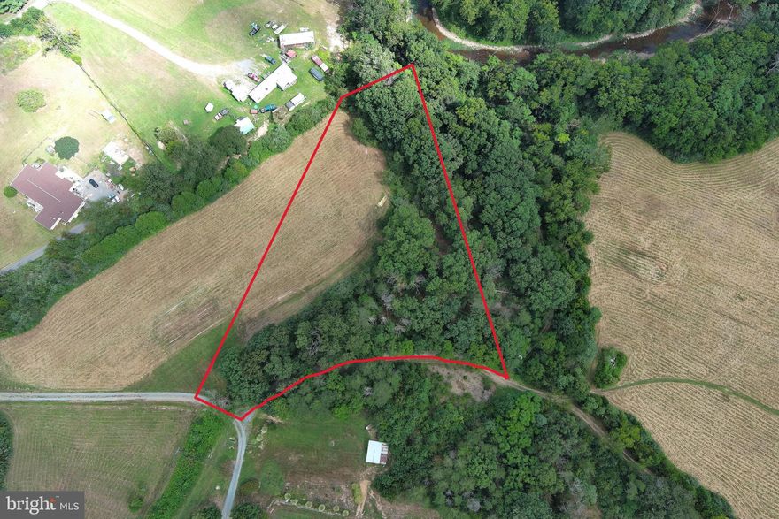 *** UNRESTRICTED *** CONVENIENT *** BUILDABLE *** 3 terms that you don't see very often describing parcels in this neck of the woods.  Located less than 45 minutes from Winchester, VA and just off of a state maintained - paved road.  With no restrictions and portions of flat, open, and wooded ground, this lot will allow the new owners various possibilities for development.  Whether you are looking for a place to put down roots or a rural spot to relax in the West Virginia hills,  this property could offer that and then some. Check it out today!