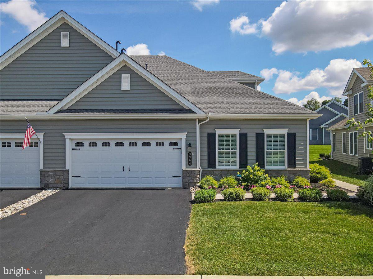 Welcome to resort-style living in this desirable 55+ community nestled on a scenic golf course! This beautifully maintained 2-bedroom, 2-bath home offers comfort and convenience in a vibrant setting. Enjoy an incredible array of amenities, including a golf simulator, pool, hot tub, and a stunning community center featuring a full kitchen, movie theater, doggie spa, conference room, weight and yoga rooms, and billiards lounge. Conveniently located just minutes from hospitals, shopping, dining, and major highways, this home combines luxury with lifestyle. Snow removal and lawn care are included, so you can spend more time enjoying the lifestyle you deserve! Come experience low-maintenance living at its finest!