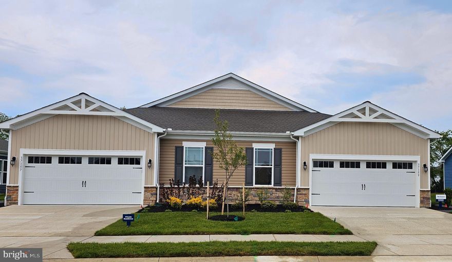 **Red Tag Sales Event now through May 3, 2026! Was $404,990 Now: $399,990! Home must close on or before 6/26/2026.** Welcome to 34226 Forest Acres Drive a move-in ready new home in Millville, DE, located in Belle Shoal, a village in the sought-after, amenity rich Millville by the Sea community. This one-story Severn floorplan, a 1,500 square foot twin villa new home, offers open-concept living with three sizeable bedrooms, two full bathrooms, and a two-car garage. 

Upon entering the home through the private, side front door, you step into the spacious living and dining area that flows nicely into the functional kitchen with well-appointed white cabinetry and quartz countertops, stainless steel appliances, a peninsula kitchen island, and a sizeable pantry. 

Enjoy the open floorplan as it allows you to entertain guests and family in your great room and kitchen simultaneously while also providing access to the quiet, covered porch at the rear of the home. 

A welcoming guest room near the entrance ensures convenience for visitors, while the nearby laundry room adds practicality. Continuing down the hall is another guest bedroom and a full bathroom. The private main suite, tucked in the back of the home, includes a large en suite bathroom and a grand walk-in closet. 

Your new home comes complete with a white blind package, a fully sodded, landscaped, and irrigated lawn, and an exclusive Smart Home® package, ensuring your peace of mind and comfort in every aspect of living. 

Pictures, artist renderings, photographs, colors, features, and sizes are for illustration purposes only and will vary from the homes as built. Image representative of plan only and may vary as built. Images are of model home and include custom design features that may not be available in other homes. Furnishings and decorative items not included with home purchase.