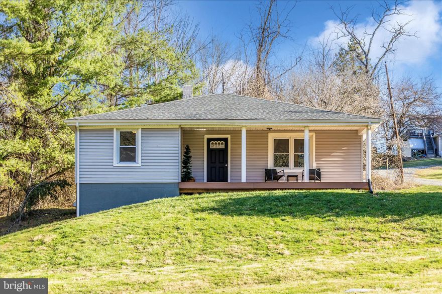 Experience the perfect blend of modern convenience and rural tranquility at 11683 Wolfsville Rd. Situated on an expansive 2.14 acre lot This adorable, fully renovated rancher offers the rare luxury of wide open space paired with seamless one-level living. Inside, you'll find durable LVP flooring throughout the main living areas. The heart of the home is bright, white kitchen with granite countertops, a classic subway title backsplash, and a full stainless steel appliance package. 

Rest east knowing the heavy lifting has already been done, with a newer roof, siding, windows, new septic system (all updated circa 2021). The unfinished walkout lower level offers a blank canvas for a home gym, workshop, or future sitting room. Enjoy the peace of no city taxes while remaining just a short drive from the amenities of Smithsburg!