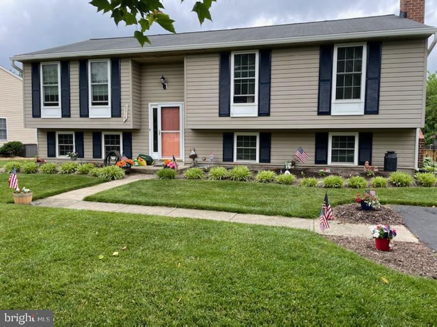 This house is a Must See! A very well kept 4-bedroom, 3 full bath house with a well-maintained yard located minutes from Historic Ellicott City. Primary bedroom has updated bathroom with a tile shower, new carpet and fresh paint. The 2nd and 3rd bedrooms also have new carpet. Beautifully updated and remodeled eat in kitchen with Quartz countertops and stainless-steel appliances and custom built-ins. The kitchen also has a movable island. There is a screened-in deck off of the kitchen. Great for entertaining or outdoor evening dinners. A spacious living room with engineered hardwood floors. The lower level has a freshly painted 4th bedroom (or office). There is also another full bathroom and laundry room with washer and dryer. A large family room with a brick wood burning fireplace. A very spacious bar area addition with vinyl plank flooring and plenty of room for entertaining family and friends!  Lovely fenced in backyard with shed.  Plenty of room for kids to play!   Easy access to Rt. 100 as well as being centrally located between Baltimore and Washington. You don't want to miss this beautiful house!