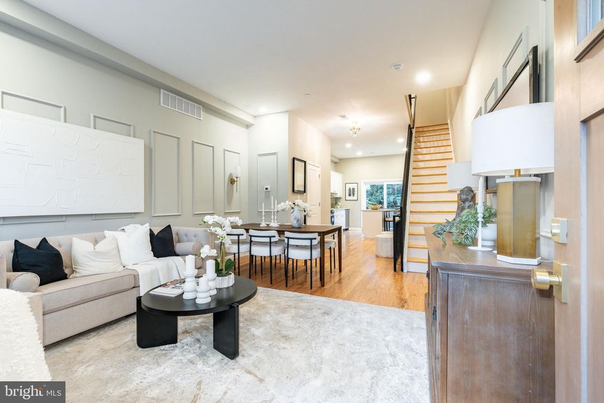 Modern luxury meets timeless South Philly charm at 109 Watkins Street — a brand-new construction 4-bedroom, 3.5-bath masterpiece featuring an entire floor dedicated to the primary suite, a fully finished basement, and 2 outside spaces including a dreamy roof deck with sweeping skyline views. Step inside to an open-concept main level filled with natural light and elevated by designer finishes, warm hardwood flooring, and sleek gold accents throughout. The chef’s kitchen impresses with white shaker cabinetry, quartz countertops, stainless steel appliances, a classic subway tile backsplash, and a spacious center island perfect for hosting and everyday living. The second floor offers two very spacious bedrooms and a spa-styled bathroom, providing comfort, style, and flexibility for guests, family, or a dedicated home office. Continue up to the primary suite floor — a true retreat featuring custom wall molding, a statement chandelier, and a luxurious spa-inspired bathroom complete with a double vanity, sleek contemporary fixtures, and a beautifully tiled walk-in shower. The suite is completed by a generous walk-through closet offering immense storage. The fully finished basement adds even more versatility with a full-sized bedroom, a multi-purpose flex space ideal for a gym, office, or media room, and a beautiful full bathroom showcasing modern tilework and sleek contemporary finishes. Outdoor living shines with both a private backyard patio on the main level and an expansive roof deck offering panoramic skyline views. Enjoy morning coffee, evening cocktails, entertaining, or simply soaking in your own elevated city oasis. But it’s not just the home — it’s the location. You’re steps from Dickinson Square Park, Bok rooftop events, and East Passyunk’s award-winning dining scene. Plus, you’ve got easy access to I-95, public transit, and all big box shopping.