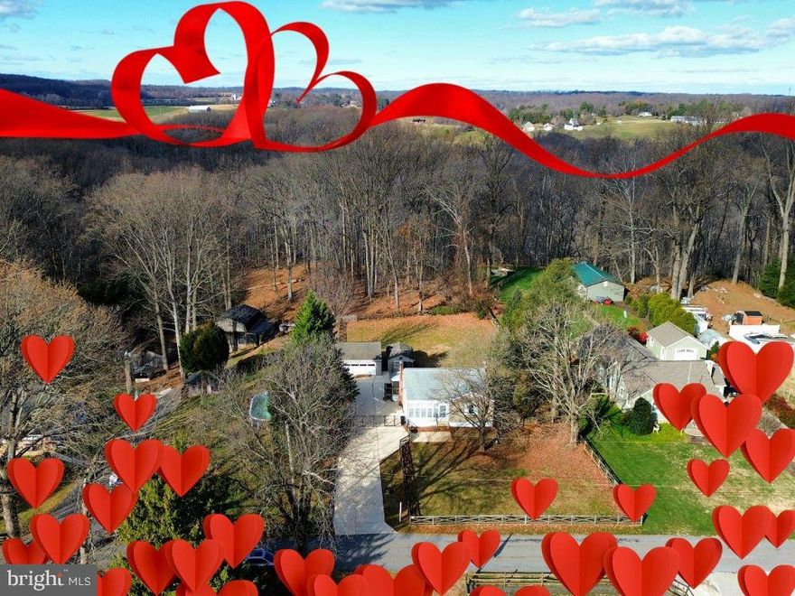 NEW PRICE — Don’t miss your chance to own this private Perry Hall retreat! Tucked away at the end of a quiet dead-end street on ONE ACRE backing to Gunpowder Falls State Park, this hidden gem offers the space, privacy, and peaceful lifestyle you've been waiting for.

From the moment you arrive, this home feels like home — featuring 3 bedrooms and 2 full baths, including two generously sized upstairs bedrooms and a versatile lower-level suite with its own full bath and private entrance. Perfect for guests, a home office, or multi-generational living, this flexible layout adapts to your needs.

Inside, enjoy fresh paint throughout, a cozy wood-burning fireplace, and updated appliances — it's truly MOVE-IN READY. Step outside to your fully fenced backyard oasis featuring a rear patio for BBQs, a covered front porch for morning coffee, a bonus storage shed, and an oversized 2-car garage. The extended gated driveway offers room for 10+ vehicles — with plenty of space to park your RV, BOAT, TRAILER, WORK TRUCK, or other recreational gear right at home.

Central air installed in 2025 provides YEAR-ROUND COMFORT.

Conveniently located near Honeygo Run Regional Park and Gunpowder Falls State Park, with easy access to hiking, biking, kayaking, and endless outdoor adventures. Just a short drive to White Marsh Mall, The Avenue at White Marsh, restaurants, retail, commuter routes, and everyday conveniences — enjoy the perfect balance of nature and accessibility.

Now at a new price — this isn’t just a home, it’s your chance to own a rare slice of Perry Hall serenity. ACT FAST BEFORE IT’S GONE!