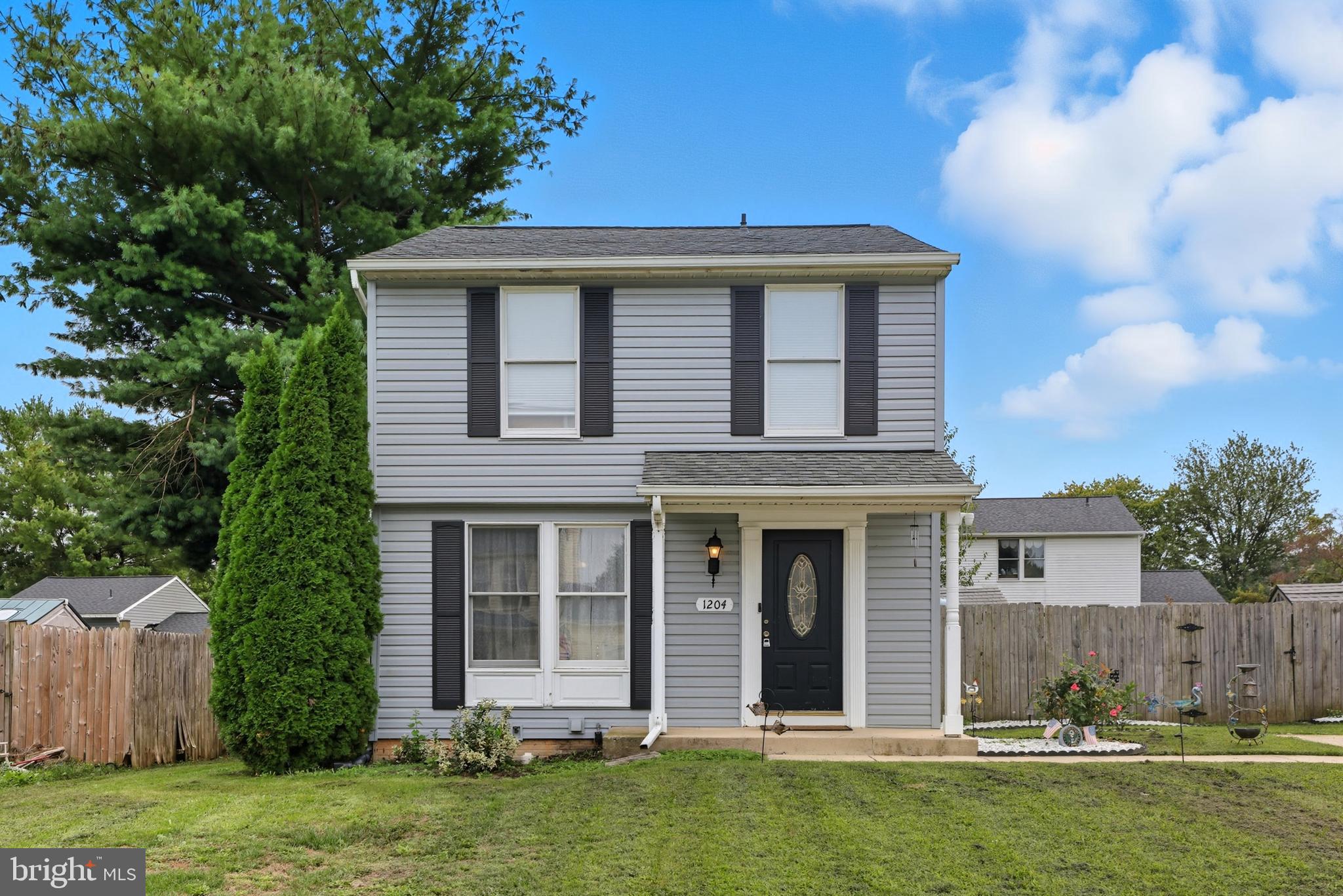 Charming three-bedroom, two-and-a-half-bath, three-level single-family home, move-in ready. The main level features an updated kitchen with granite countertops and high-end appliances, along with distinct living and dining areas. A spacious deck overlooks a large fenced yard with a shed, providing an ideal setting for outdoor gatherings. The upper level offers three bedrooms and a full bathroom, while the fully finished basement provides flexible living space and a beautifully updated full bathroom. Recent improvements include a new HVAC system (2019) and roof and siding replacement (2018). Conveniently located near shopping, dining, and essential amenities. Don't miss the opportunity to make this home yours!