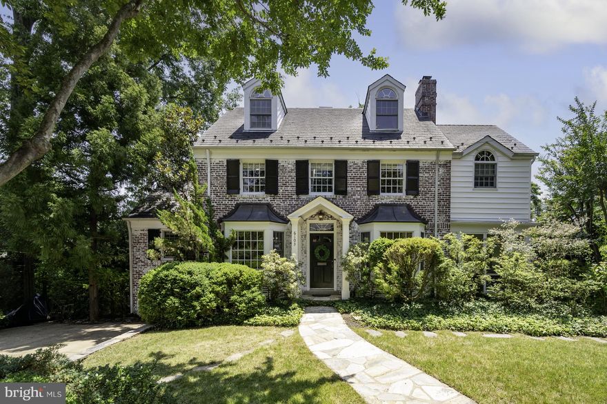 THE OPEN HOUSE HAS BEEN CANCELLED FOR TODAY AND TOMORROW!  Located between Saunders Circle and Fort Willard, this home is at the heart of the Belle Haven Community.  6103 Woodmont Rd beckons you in through its gated arch and beautifully landscaped front yard offering you a place to make lasting memories!   Bay windows flank the front door of this Center Hall colonial and complement built-ins which  can hold and display your special china.   The gracious dining room is perfect for seating and entertaining a large dinner party.  The kitchen is open to the dining room and offers spacious cabinetry, stainless steel appliances including a Fisher Peykel refrigerator, a GE double oven and stove, a pantry, and 2 windows letting in natural light.  The breakfast area and family room are surrounded by a wall of windows and views of the gorgeous backyard garden and trees.  The fireplace in the living room creates a cozy atmosphere and the adjacent screen porch provides great pleasure spring, summer, and fall.   On the second floor, the owners' suite contains 2 cedar closets and a dressing room with more closet space.   The ensuite bath has a walk-in shower and double sinks.  The charming second primary bedroom boasts an ensuite bath, dressing room, and huge walk-in closet.  On the 3rd floor, architectural windows enhance the 3rd and 4th bedrooms with a full bath.  The fully finished downstairs area is completed by a large rec room/playroom, an office with built-ins for wine storage, a bedroom with ensuite bath, a laundry room, and a huge, conditioned storage area.  The .28 acre lot offers 2 - 3 parking spaces in the driveway. This home is in walking distance to the Belle Haven Country Club, close to the GW Parkway and bike path, I-495, excellent shopping, Old Town restaurants, and Huntington Metro.  Photos will be taken tomorrow.