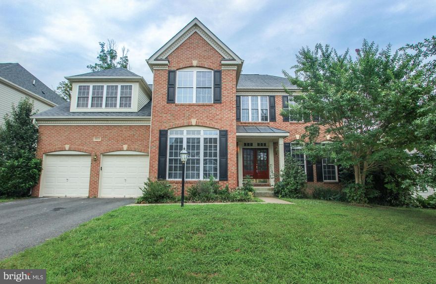 Beautiful and Spacious! NEW carpet, paint, MORE!! Open Kitchen/Fam Rm w/FP, formal LR & DR w/architectural detail. Main lvl library & adjacent full bath provide versatility. Upstairs find a luxurious owner's retreat AND princess suite! Lower lvl has finished rec room, full BA, & 2 flex rms. Tons of space for everyone, easy access for commuters & popular area close to shopping, services, & schools!