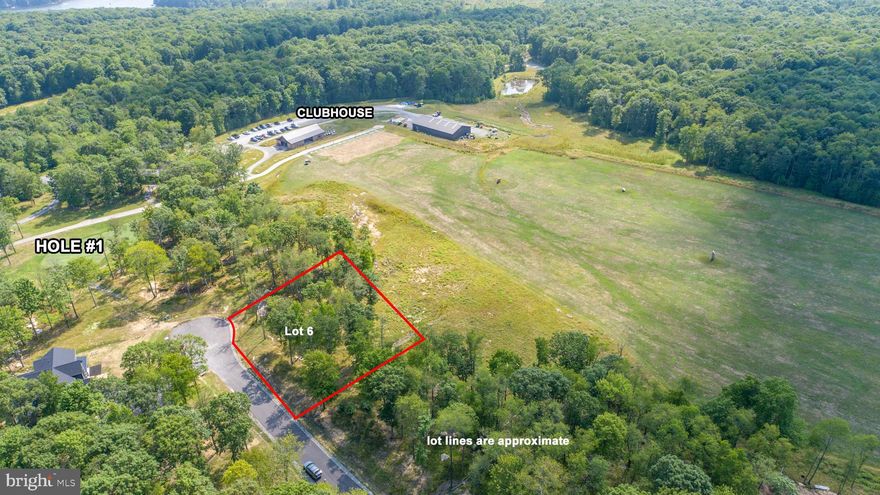 Wooded, level half-acre homesite tucked inside the Lodestone Golf Course! Located on a private cul-de-sac, Lot 6 sits off the beaten path while keeping you close to Deep Creek Lake, Wisp Resort, state parks, and all the local spots. Public water and sewer hookups available. Quick and easy access to Fork Run Recreation Area with over 8 miles of hiking and biking trails, rock climbing and more! A clean, build-ready setting in one of Deep Creek’s most sought-after mountain communities. Call today for details!