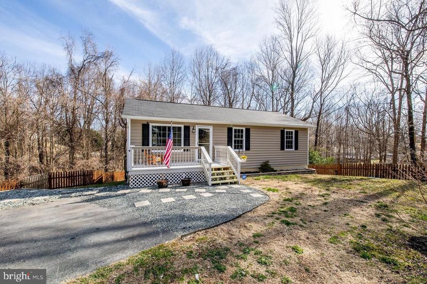 Welcome to this beautifully maintained 4 bedroom and 3 full bathroom, move-in ready home nestled on a spacious .73-acre private lot. From the moment you step onto the inviting front porch and enter the living room, you'll be greeted by a warm and welcoming atmosphere. The open-concept layout seamlessly flows throughout the main living areas, providing an ideal space for both relaxation and entertaining.
The kitchen features sleek stainless steel appliances and offering easy access to the dining area, which opens directly to a large back deck — perfect for outdoor dining or relaxing in the fresh air. The primary suite, located down the hallway, boasts a private bathroom with a stunning tiled shower. Two additional well-sized bedrooms and a full hallway bathroom complete the main level.
The finished lower level offers even more living space, including a spacious family room, a 4th bedroom, a full bathroom, and a laundry room with abundant storage. This level also provides convenient walk-out access to the backyard, where you'll find plenty of room for outdoor activities, whether it's entertaining guests or playing with your pets.
In addition to this wonderful home, the surrounding area is equally impressive. Just minutes away, you'll find Brownies Beach, a local gem for beachcombing and fossilized shark tooth hunting. For summer fun, the Chesapeake Beach Water Park is nearby, offering a lazy river and water slide for all ages. Dining options are abundant, with delicious restaurants such as Hook & Vine, Rod N' Reel, and Sweet Sue's Bake Shop all within reach.
This property offers the perfect blend of comfort, convenience, and location — schedule your showing today!