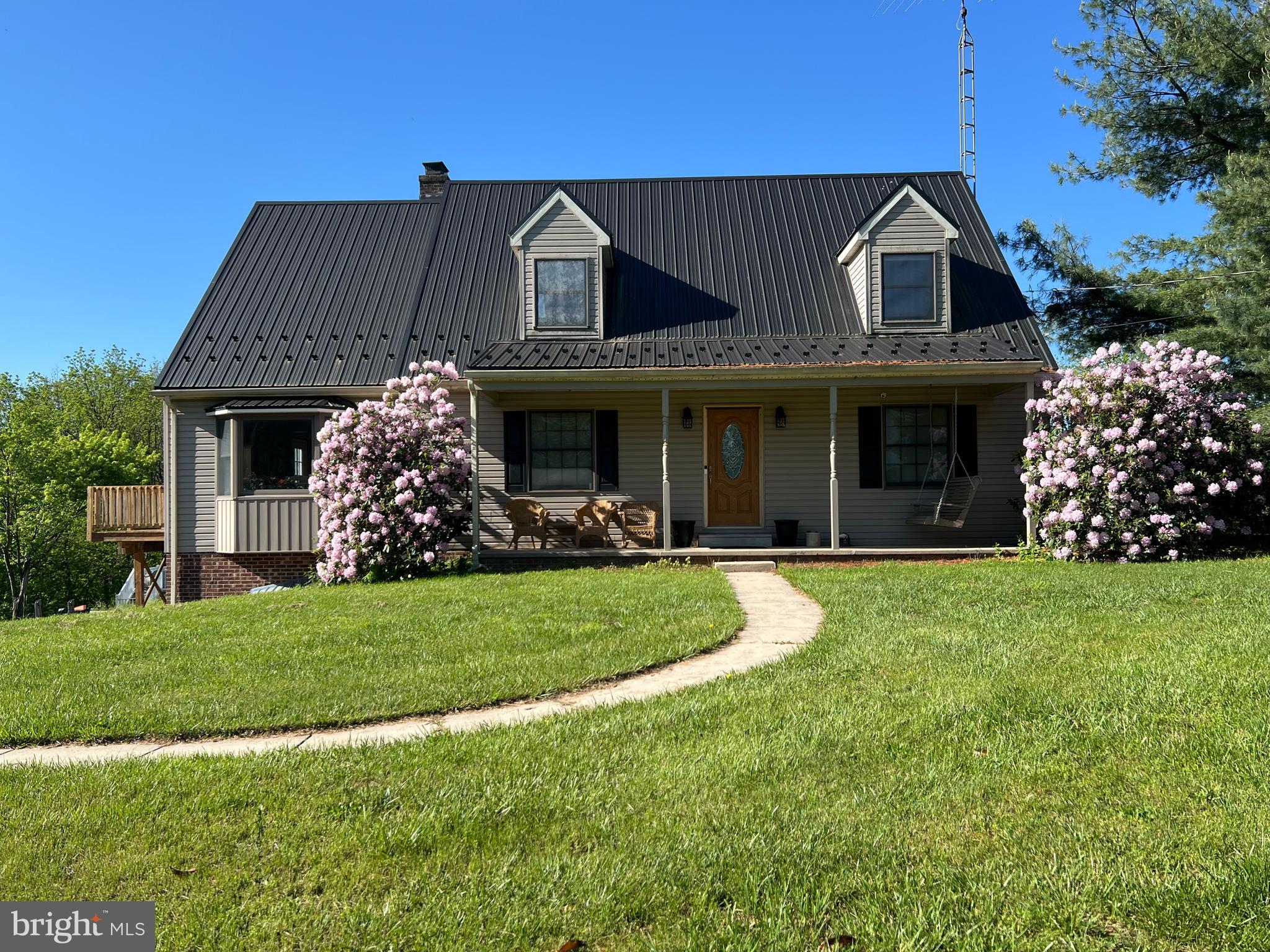 A Private Retreat Like No Other!
Welcome to a "nature lover’s dream"—this beautifully maintained 3-bedroom, 2.5-bath Cape Cod offers over 3,000 sq. ft. of thoughtfully designed living space, tucked away on 5.77 gently rolling acres of woods and bordering a spring-fed creek and breathtaking views.
Surrounded by stunning views of the mountains and Whitetail Ski Resort, this peaceful property offers the perfect balance of privacy, comfort, and connection to the outdoors.
A long, paved, tree-lined driveway leads you to a quiet sanctuary with a spacious front yard and mature landscaping that sets the tone for what’s inside.
Step through the front door into a sun-filled, open layout featuring large, light-filled rooms, an expanded kitchen with new flooring, fresh trim, and elegant crown molding and panoramic views — a stylish and functional space perfect for cooking and entertaining.
The living room is enhanced by a wall of glass doors, a vent-free gas log fireplace, and a built-in Klipsch surround sound system for cozy winter nights and movie marathons. The open kitchen features updated flooring, abundant natural light, and a spacious layout ready for everyday use or your future design vision.
The main-floor primary suite is a true retreat, offering custom cabinetry, a walk-in closet, and a luxurious ensuite bath with an oversized travertine marble-tiled shower. Upstairs, the loft style family room with skylights connects to two spacious bedrooms, an elegantly updated marble-tiled full bath, and expanded closet space perfect for family, guests, or a hobby room.
Step into comfort with the new carpeting that spans the entire home, creating a fresh and inviting atmosphere.
A dedicated home office/study on the main level features oak hardwood flooring, built-in cabinetry, and lighted shelving, making remote work a breeze.
The home is also equipped with low-voltage wiring for phone, cable, and internet, all routed to a central panel, perfect for a modern lifestyle.
A built-in lower-level garage provides easy, weather protected access to the home and additional flexibility for storage or workshop space.
Additional highlights include, Above-ground pool with composite deck, ideal for summer fun,
Custom obstacle course/play area nestled into the trees,
Workshop outbuilding with workbench for hobbies and storage,
Large Deck with beautiful views of the mountains and woods,
Fenced backyard with three gates, perfect for pets, kids, or added privacy,
ATV-friendly trails, a meandering creek, and a sloped backyard perfect for sledding,
Abundant wildlife sightings: deer, turkeys, rabbits, birds, and more,
Large unfinished basement storage space and lower-level home gym, Located in the highly rated Tuscarora School District, just 10 minutes to I-81, equidistant to Mercersburg and Greencastle.
Whether you’re searching for a private homestead, a family retreat, or simply a quiet place to enjoy scenic beauty and open space, this one-of-a-kind property offers unmatched serenity and charm. It’s more than a home, it’s a lifestyle.
Come experience the peace and beauty for yourself, schedule your private showing today!