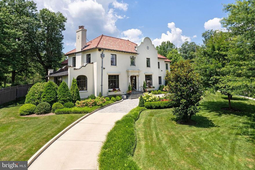 Prominently sited in prestigious Observatory Circle, the historic Heurich-Parks House at 3400 Massachusetts Avenue, NW presents a rare opportunity to own a fully reconstructed Washington estate. Originally built in 1925 by architect Albert S.J. Atkinson and once home to Christian Heurich Jr., a philanthropic businessman, as well as Marshall Parks, known as the "Father of Pediatric Ophthalmology". This distinguished Spanish Mission-style residence was masterfully reconstructed and expanded in 2017 by renowned BarnesVanze Architects, seamlessly blending historic provenance with modern luxury. Set on a beautifully landscaped and level 0.39-acre lot with irrigation, the property is introduced by a grand circular driveway and features a detached 2-car garage with guest house studio above and additional parking pad. Encompassing approximately 13,900 square feet, the residence offers 7 bedrooms, 9 full baths, 2 half baths, and an elevator. The main level is defined by elegant entertaining spaces, complemented by a stunning open kitchen with marble countertops, herringbone floors, and a sunlit breakfast room. Designed for both grand-scale living and everyday comfort, the home includes an extraordinary indoor swimming pool with pool bath, bar, and Desert Air dehumidification system.  A convenient main level bedroom suite also completes this level. The luxurious owner’s suite features a spa-inspired bath and dual walk-in closets. There are four other bedroom suites on this level. The expansive lower level offers a recreation room, exercise room, wine storage, laundry, full bath with sauna, and multiple storage rooms. A truly exceptional offering combining architectural significance, modern amenities, and premier location adjacent to the Naval Observatory and Vice President's Mansion!