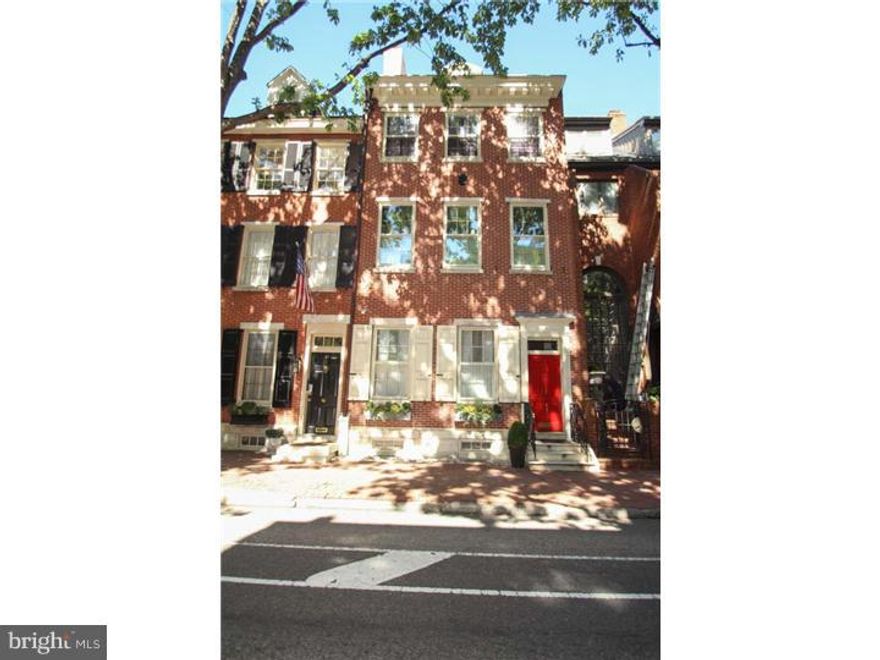 Rare opportunity to live on Society Hill's best block in this meticulously renovated and appointed townhome featuring historic details, contemporary finishes, attached 2 car garage and private outdoor space.  This 20 foot wide, 5000 sq. ft, 4 bedroom/3.5 bath townhouse offers a dramatic first floor with open living room, formal dining room, magnificent eat in kitchen and powder room.  Second floor leads to private rear deck and master suite complete with adjoining family room/dressing room outfitted with custom closets and fireplace. The third level houses two spacious guest bedrooms w/ Jack and Jill bath and laundry area. Fourth floor, featuring guest suite with private bath, has been used gym/office/playroom in the past. Finished lower level has media room and tons of closets/storage space.  This home truly has it all, magnificent historic fa ade, high ceilings, original crown molding, original pine flooring, original fireplaces/mantels, private outdoor space, garage parking, and lots of sunlight.